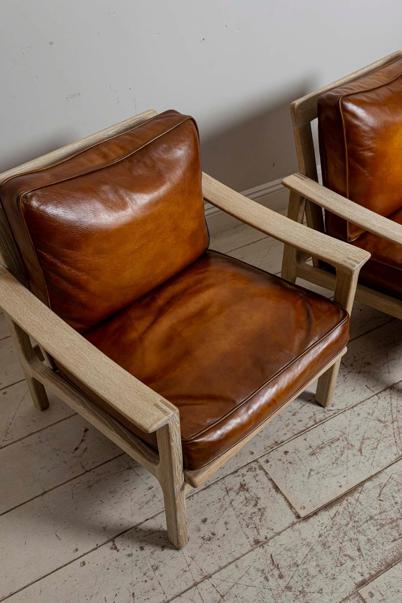 Bleached Pair of Midcentury Børge Mogensen Slatted Oak and Deep Leather Armchairs