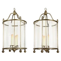Pair of Midcentury Brass and Curved Glass Lanterns