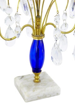 Pair of mid century brass and cut glass decorative candlesticks