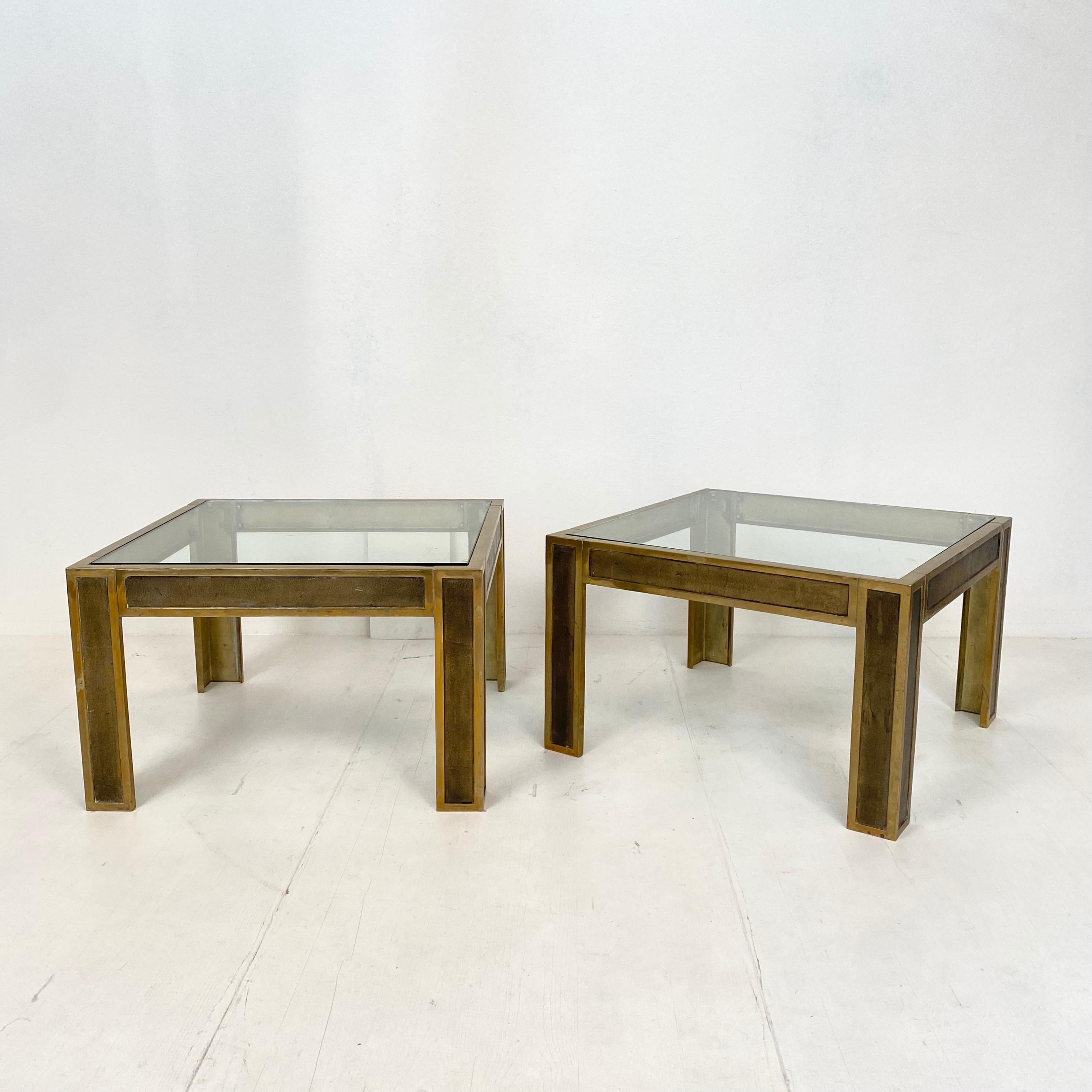 This beautiful pair of mid-century brass and glass sofa tables or coffee tables by Peter Ghyczy
where made in the 1970s. They are made out of heavy brass and a thick glass top.
Wonderful original patina condition.
A unique piece which is a great