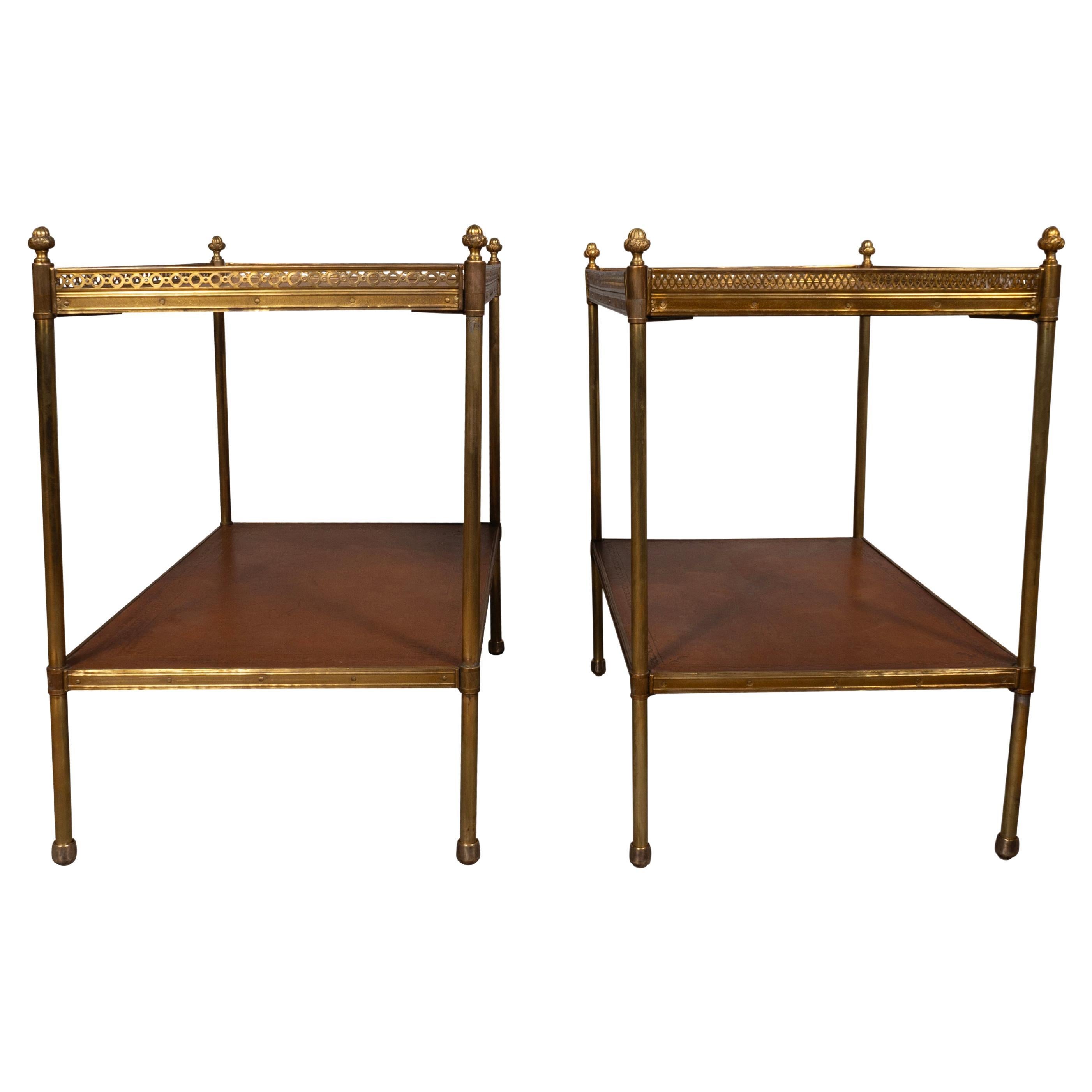 Two tier with brown leather shelves and brass gallery and legs.