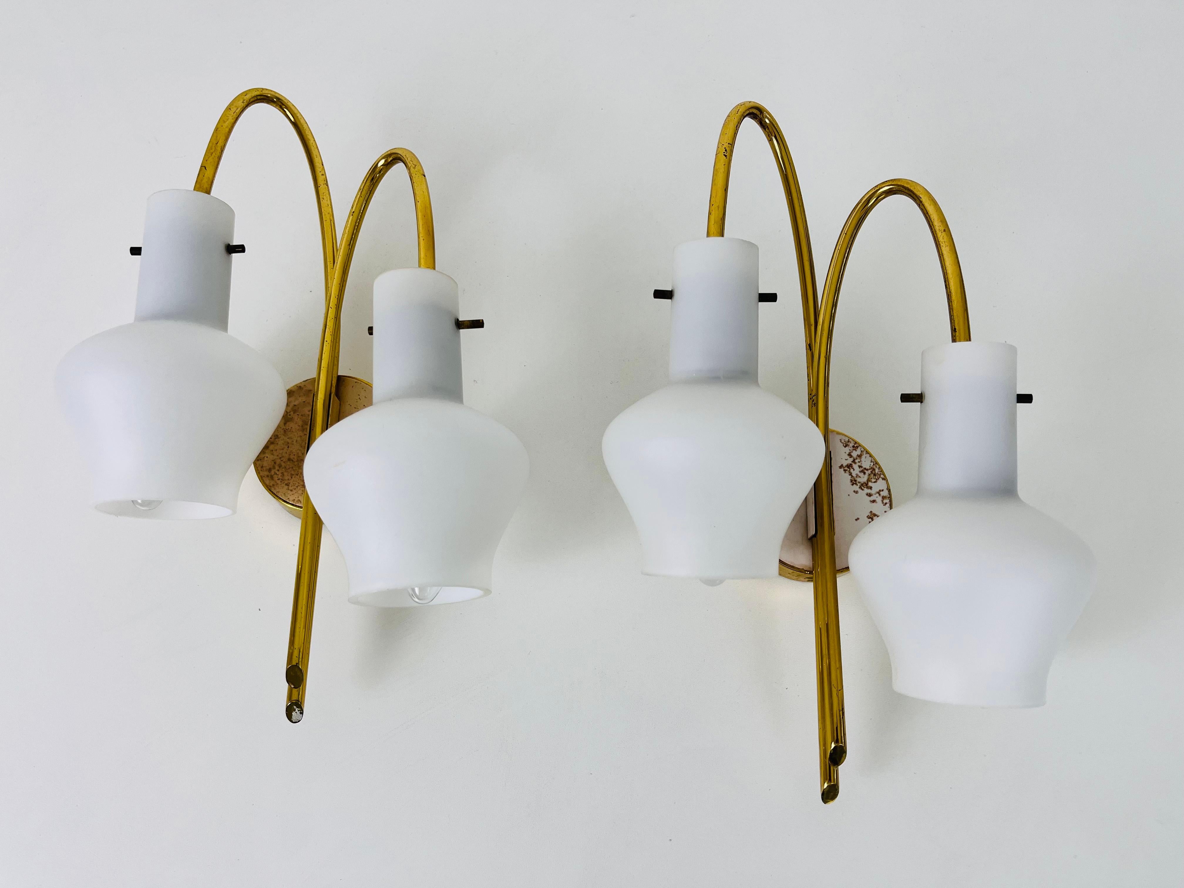 Italian Pair of Mid-Century Brass and Opaline Glass Wall Lamps, Italy, 1960s For Sale