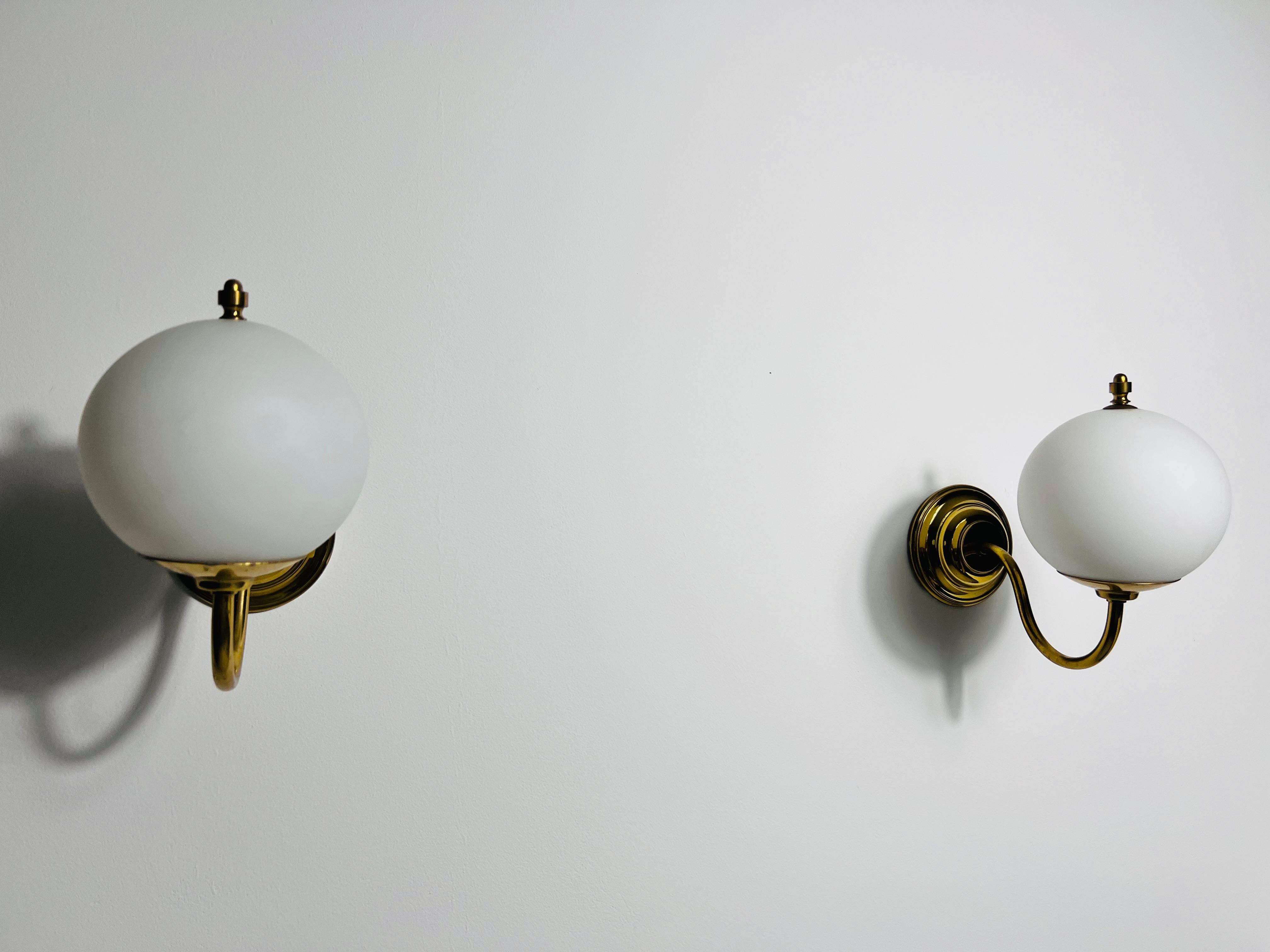 Italian Pair of Mid-Century Brass and Opaline Glass Wall Lamps, Italy, 1960s For Sale