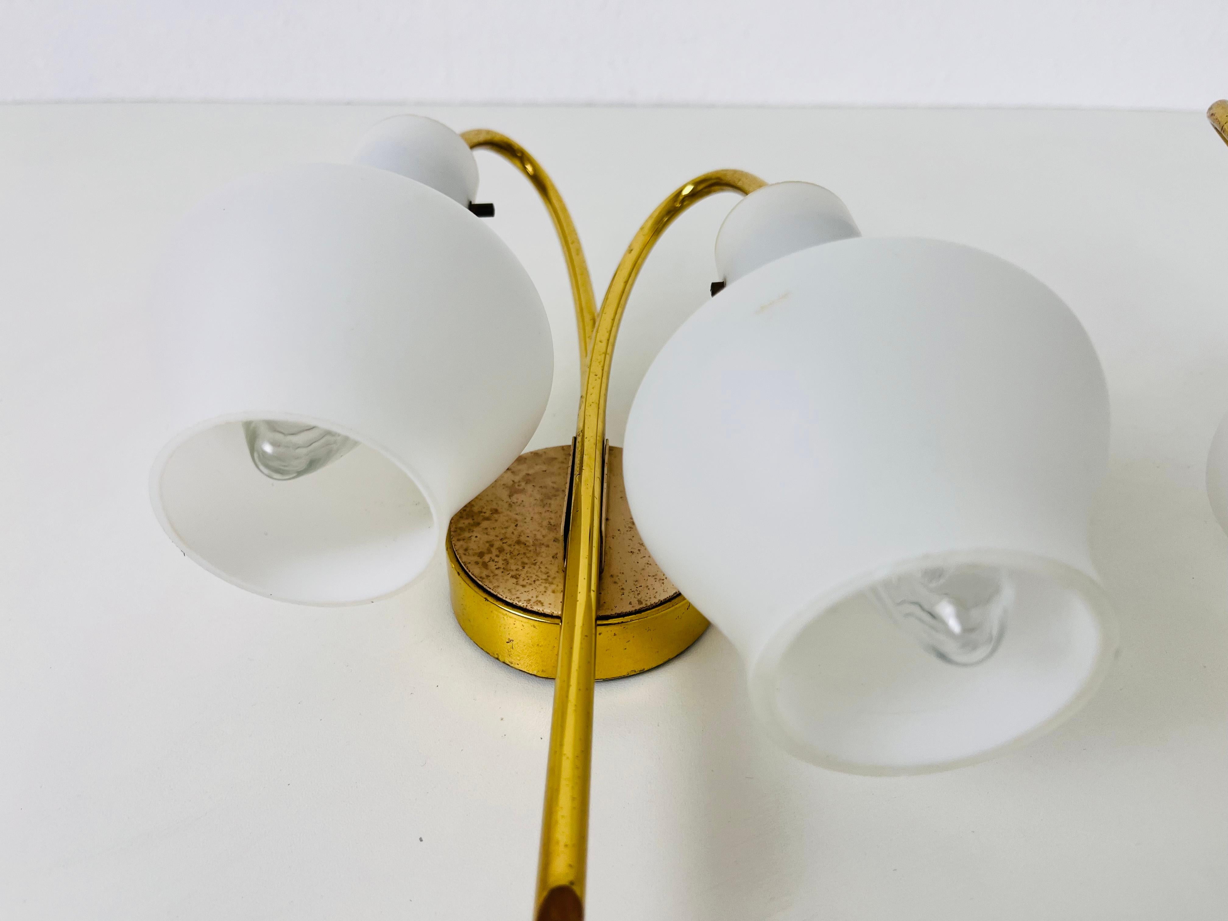 Mid-20th Century Pair of Mid-Century Brass and Opaline Glass Wall Lamps, Italy, 1960s For Sale