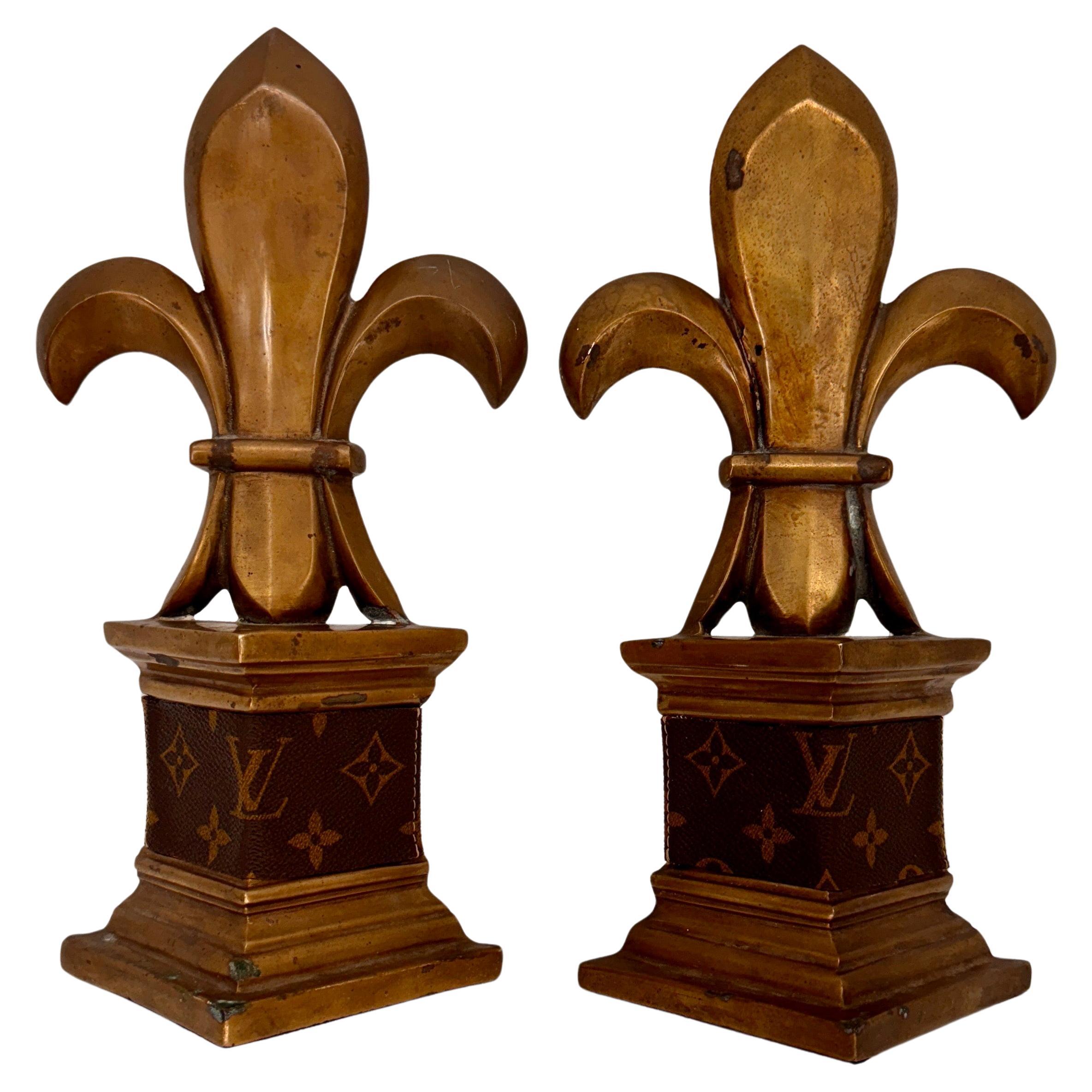 Mid-Century Pair of Brass Bookends with Louis Vuitton Monogram Fabric

These custom made, substantial and very classic French fleur de lis bookends are hand crafted with authentic LV fabric. This classic pair are absolutely one of a kind and most