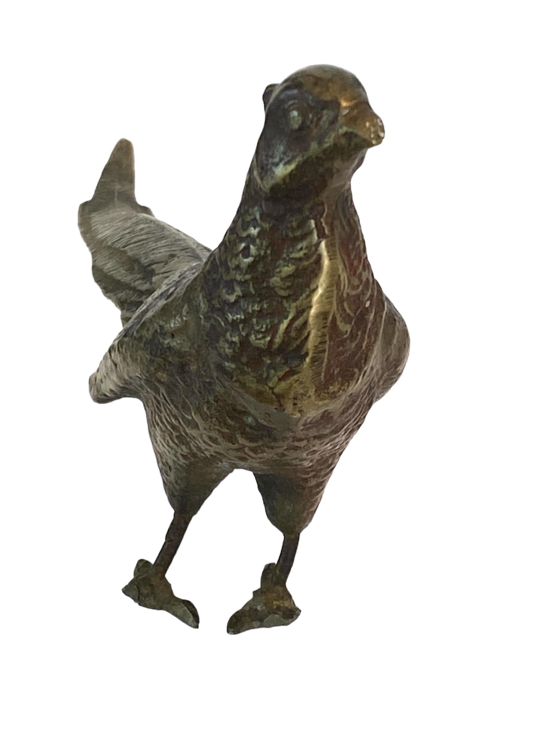Mid-Century Modern Paire de poules en laiton du milieu du siècle en vente