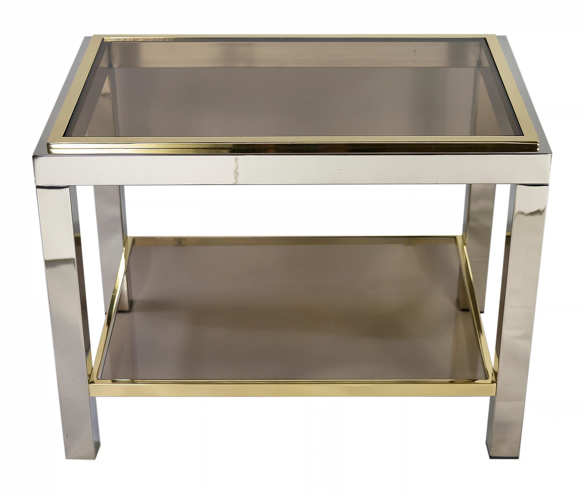 This pair of mid-century Italian side tables made of brass and chrome frame with smoked glass.
Heavy and solid, very good condition (newly polished).