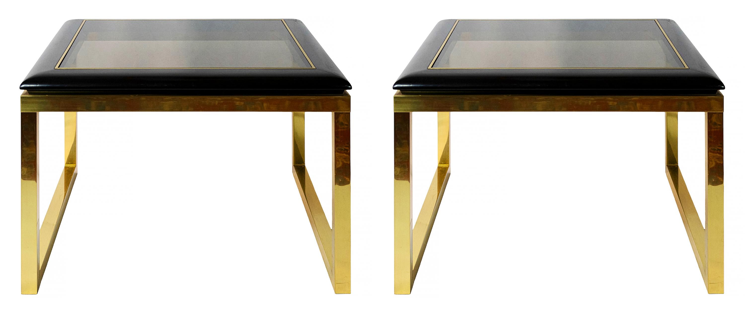 Pair of mid-century French side/sofa tables in brass and black color wooden frame top with smoked glass inside.
Very good vintage condition.
