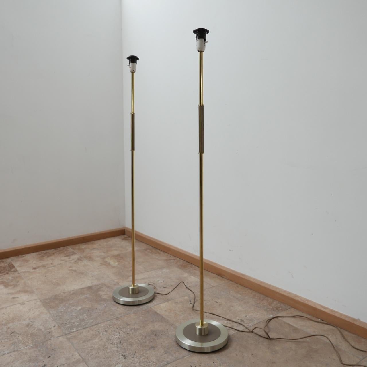 A pair of elegant mid 20th century floor lamps. 

3/4 Height initially which can be raised in height with the addition of a shade. 

Sweden, c1960s. 

Possibly for Asea. 

Since re-wired and PAT tested. 

Price is for the