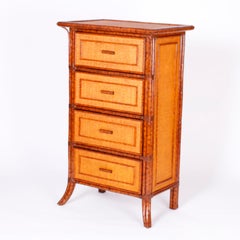 Paire de commodes en faux bambou et toile de gazon de style colonial britannique du milieu du siècle dernier