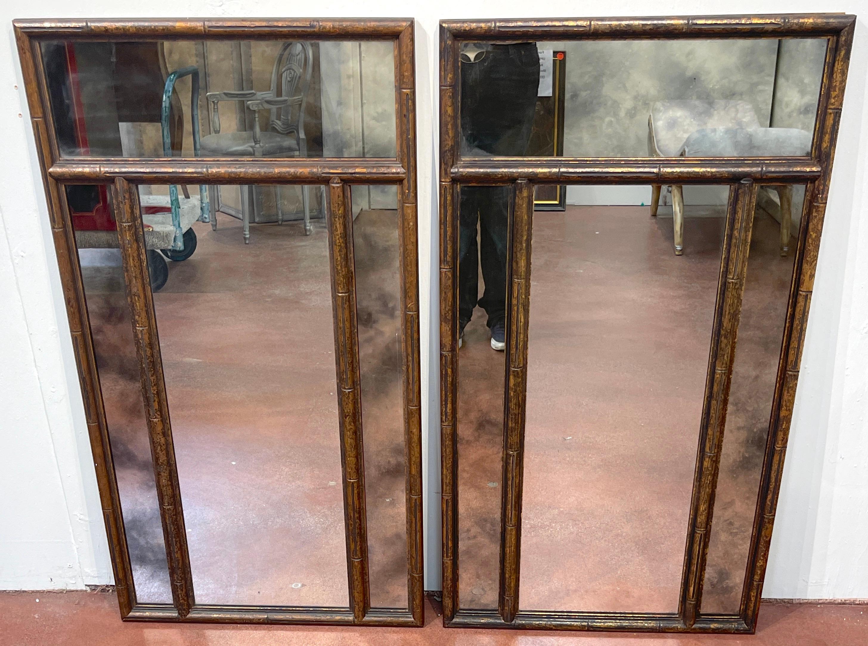 Pair of Mid-Century Bronzed Trellis Mirrors
USA, circa 1960s

A pair of Mod Mid-Century bronzed trellis mirrors from the USA, circa 1960s. Each mirror stands an impressive 47.5 inches high and 26.5 inches wide, designed with a trellis-style surround