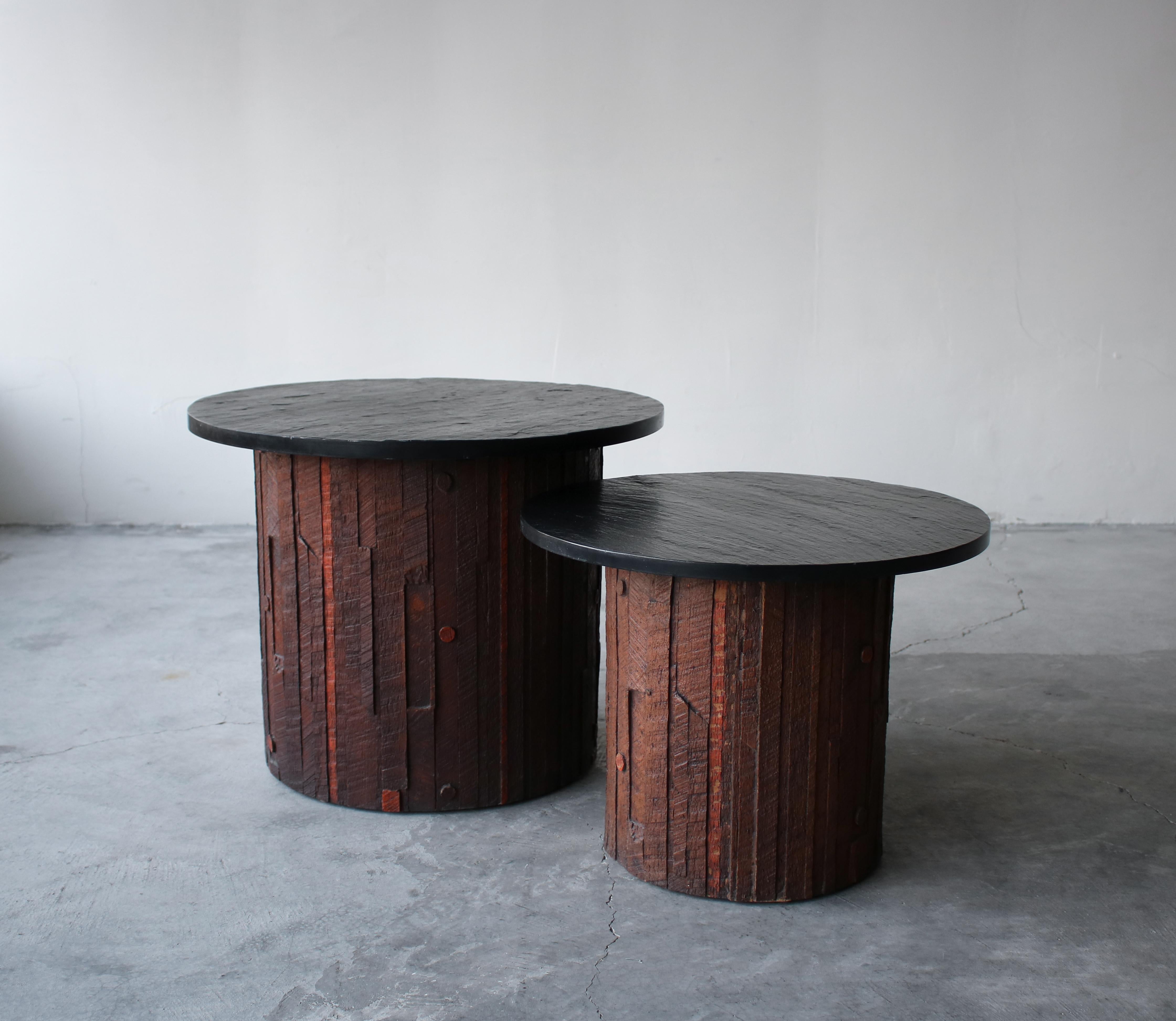 Pair of tiered Brutalist end tables by Lane for the Pueblo collection. This is a very rare and unique set. Constructed out of a molded resin with slate tops. When furniture becomes art!

Tables are in excellent condition with no imperfections to