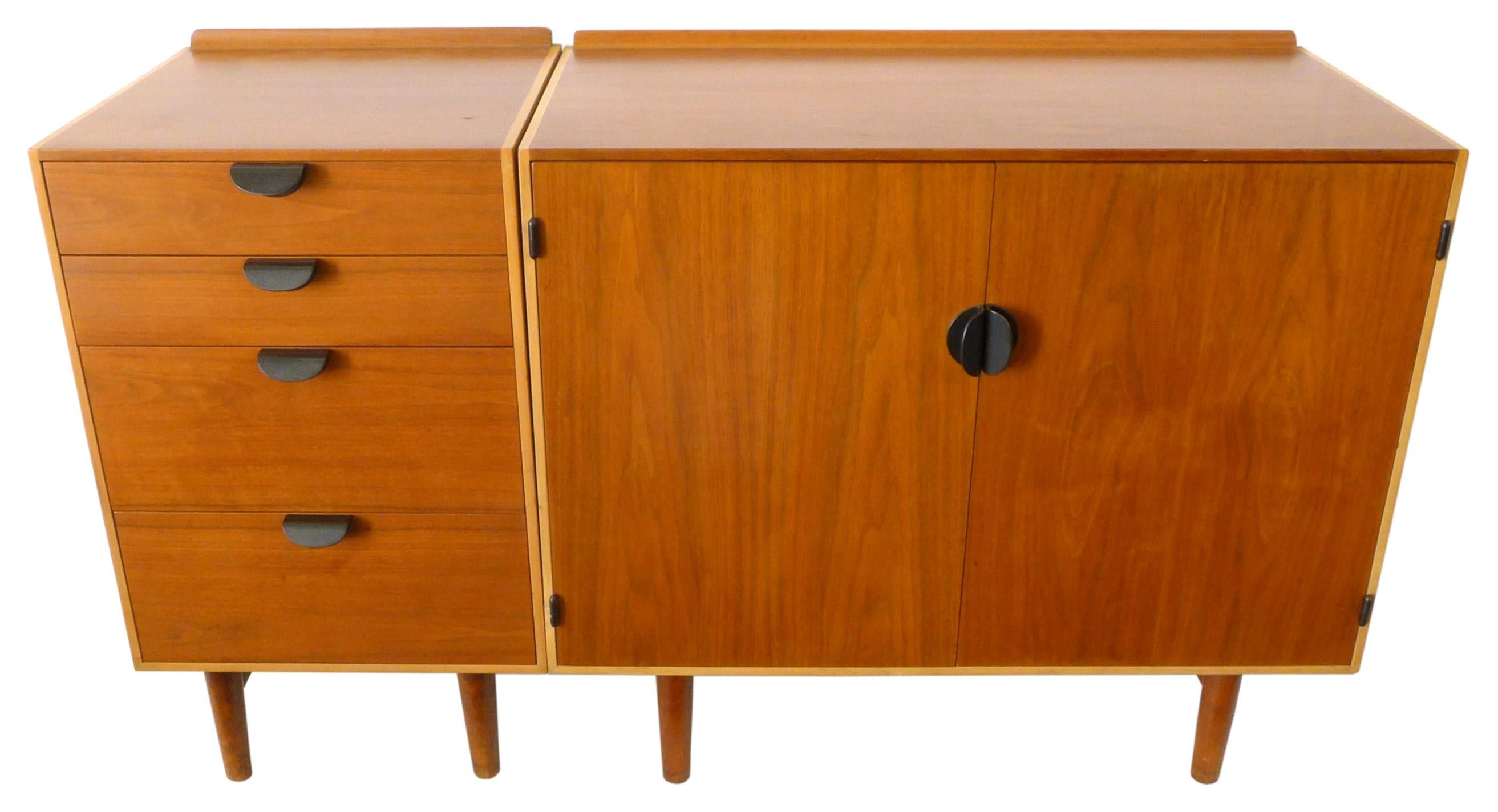 A handsome pair of Mid-Century Cabinets by Finn Juhl for Baker. Classic Danish modern style, quality and materials; two beech and teak cabinets with bronze pulls, one unit with four drawers, the other two doors concealing two drawers and movable