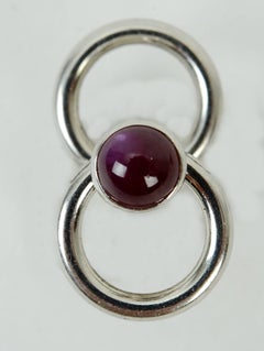 Coppia di gemelli a doppia staffa in platino e rubino cabochon di metà secolo