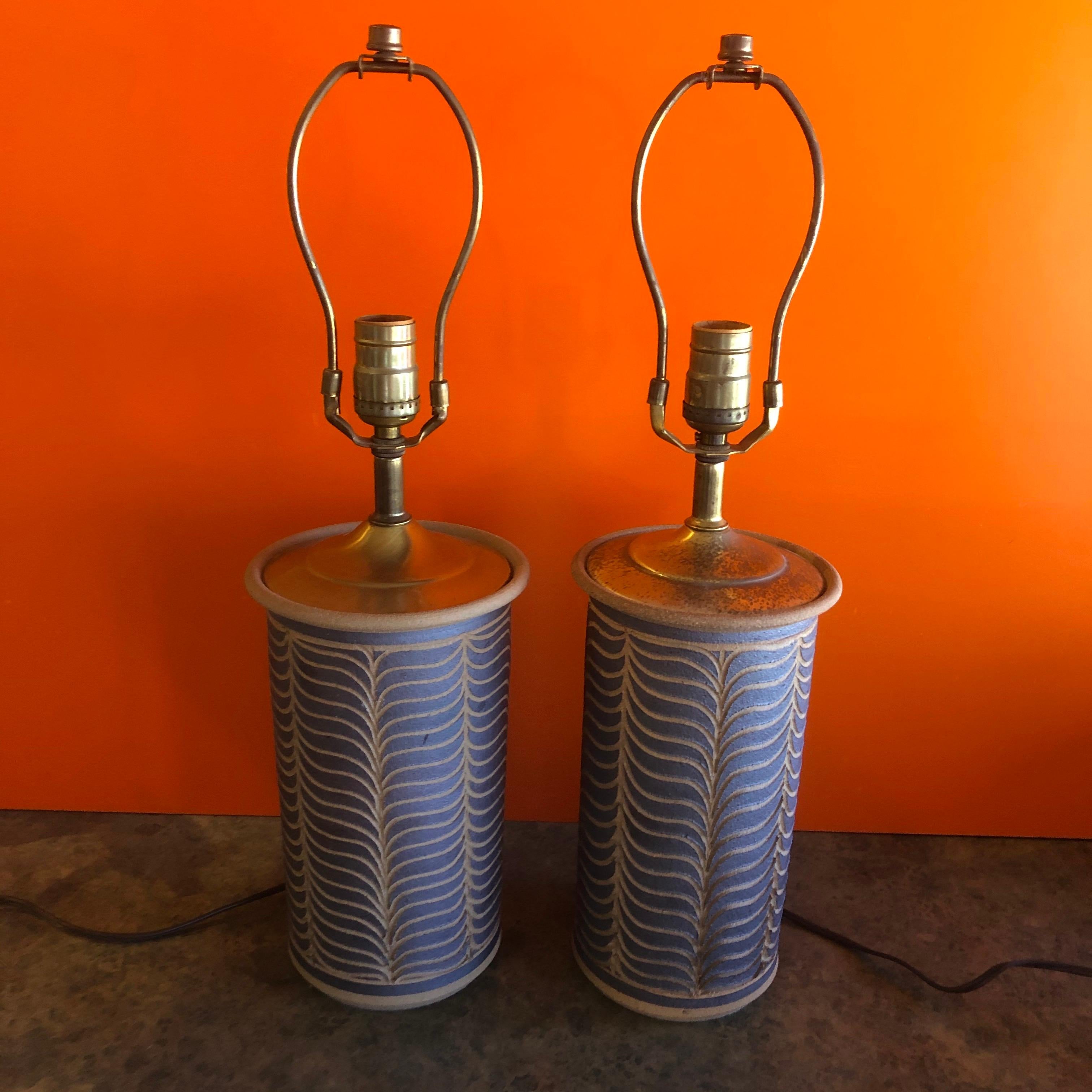 A gorgeous pair of midcentury California studio pottery stoneware table lamps, circa 1960s. The lamps, in the style of David Cressey & Robert Maxwell, measure 6.5