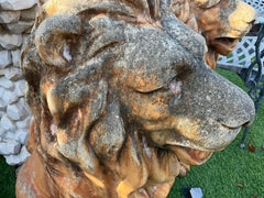 Pair of Mid-Century Cement Lions with Weathered Terracotta Finish