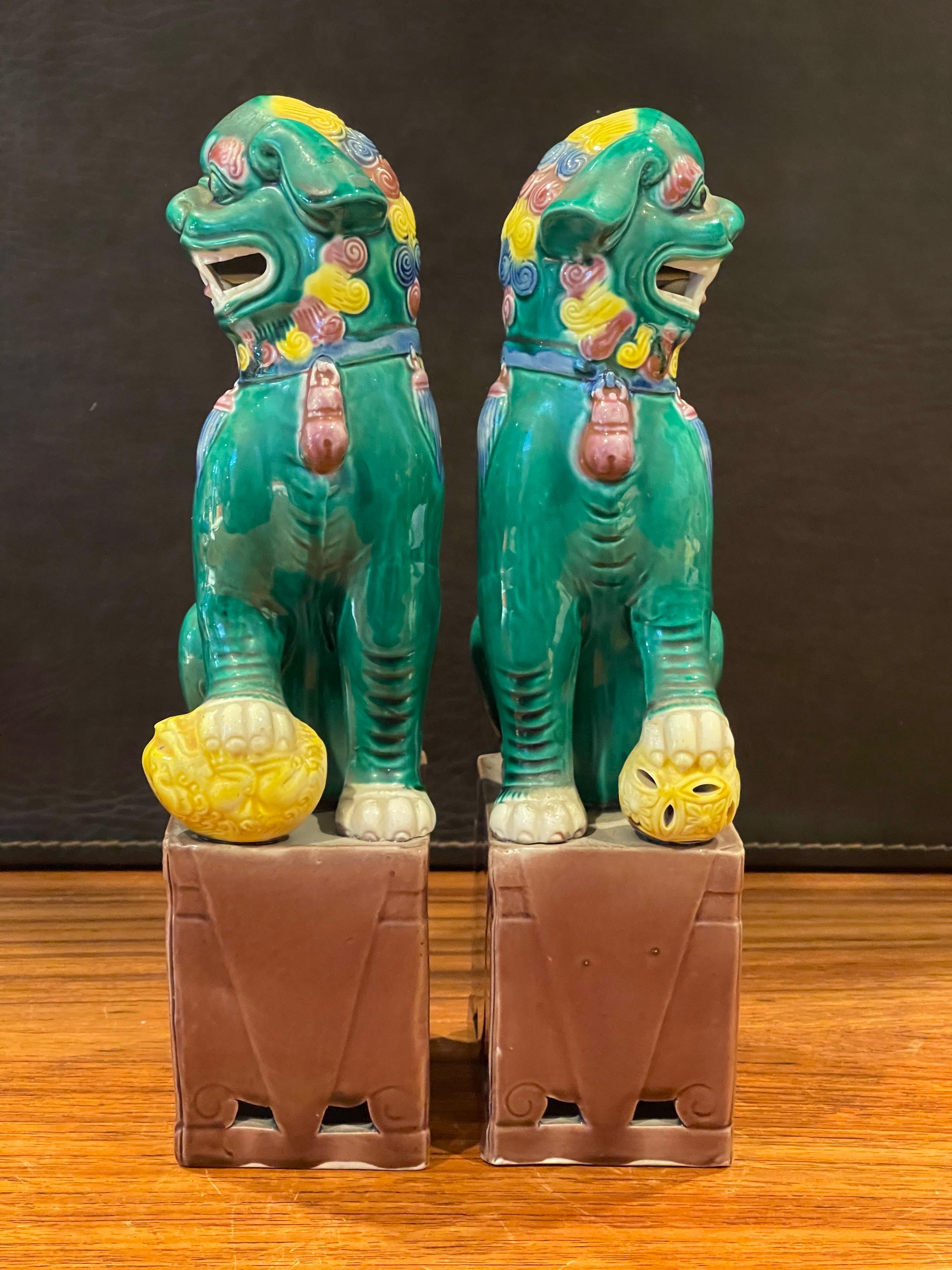Chinese Pair of Midcentury Ceramic Foo Dogs or Bookends