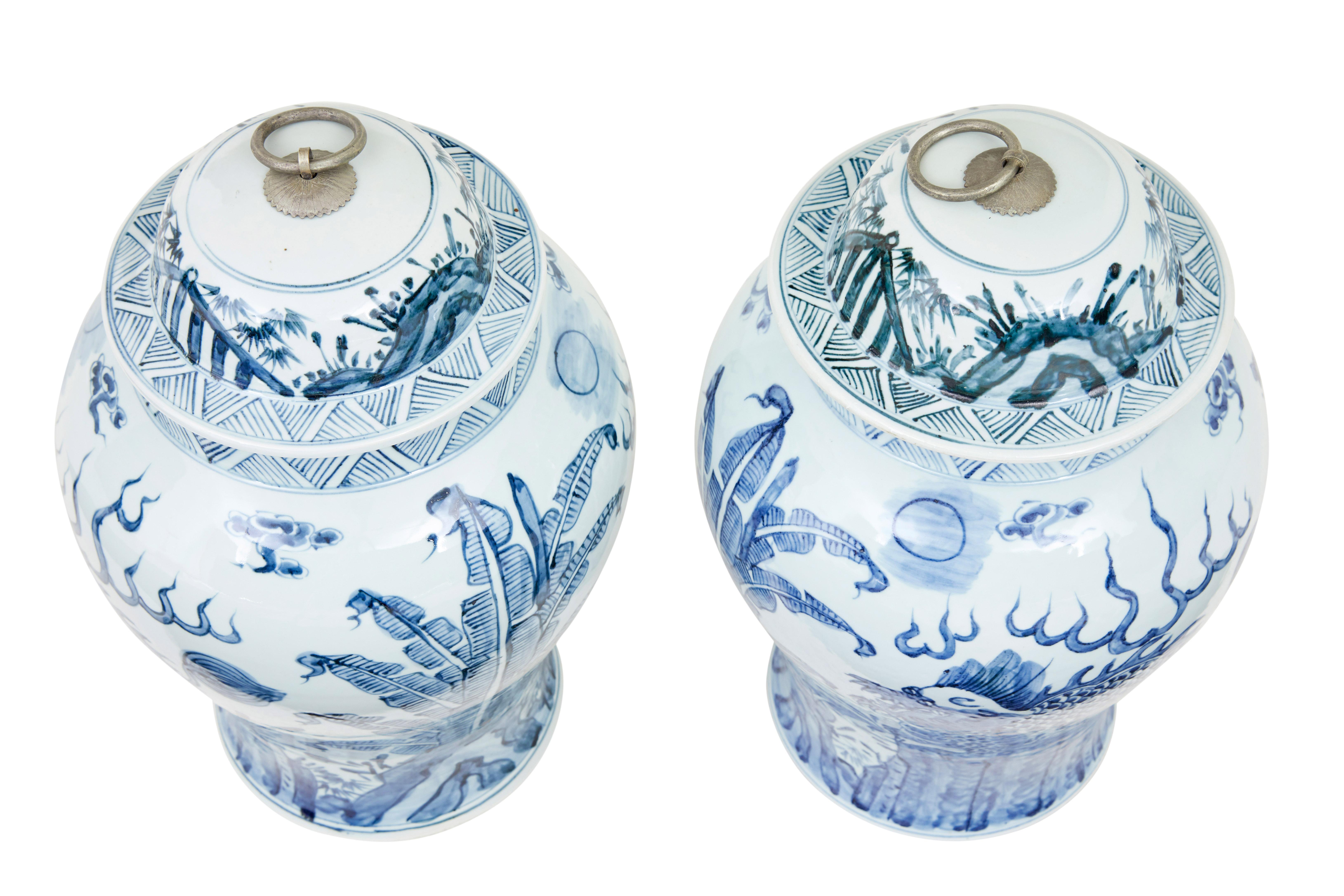 Pair of mid century ceramic ginger jars circa 1960.

Good quality Chinese export pieces, which are ideal for display purposes.

Hand painted with dragons and foliage.  Lift off lids which could be used for storage.  Please note that the lids are
