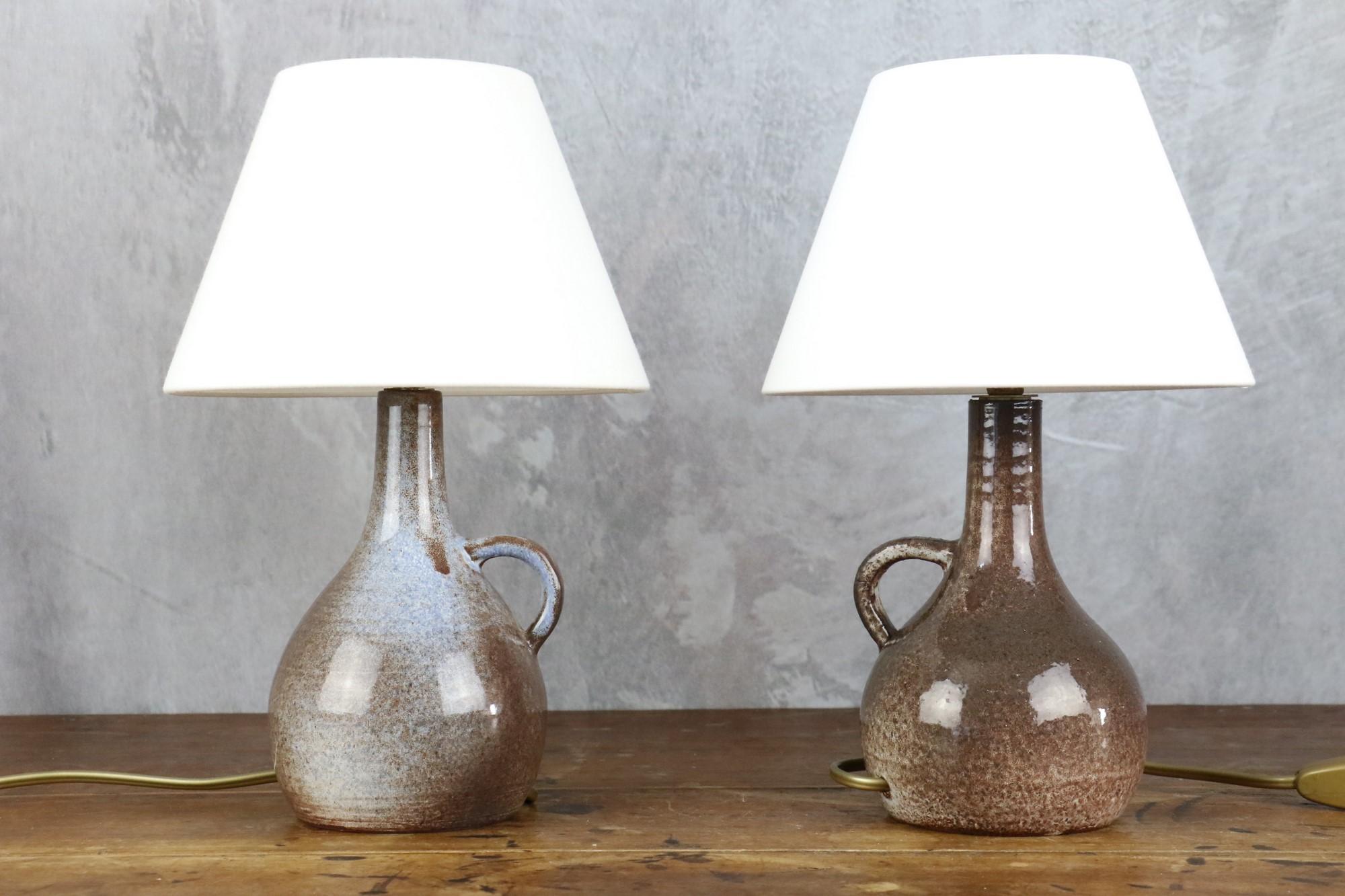 Pair of Mid-century ceramic lamps by Robert Chiazzo, 1960s

Lovely pair of ceramic lamps by Robert Chiazzo, a ceramist from Vallauris' golden age in the 50s and 60s. These two lamps work as a duo, as they are delicately glazed in brown, one also