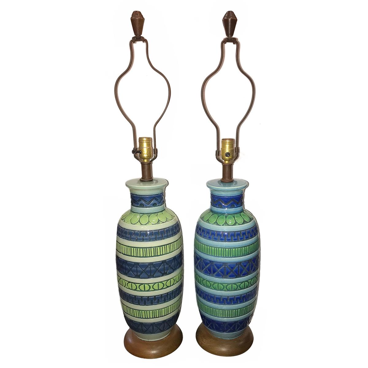 Pair of circa 1960's Italian blue and green glazed ceramic table lamps with horizontal pattern decoration.

Measurements:
Height of body: 19.5