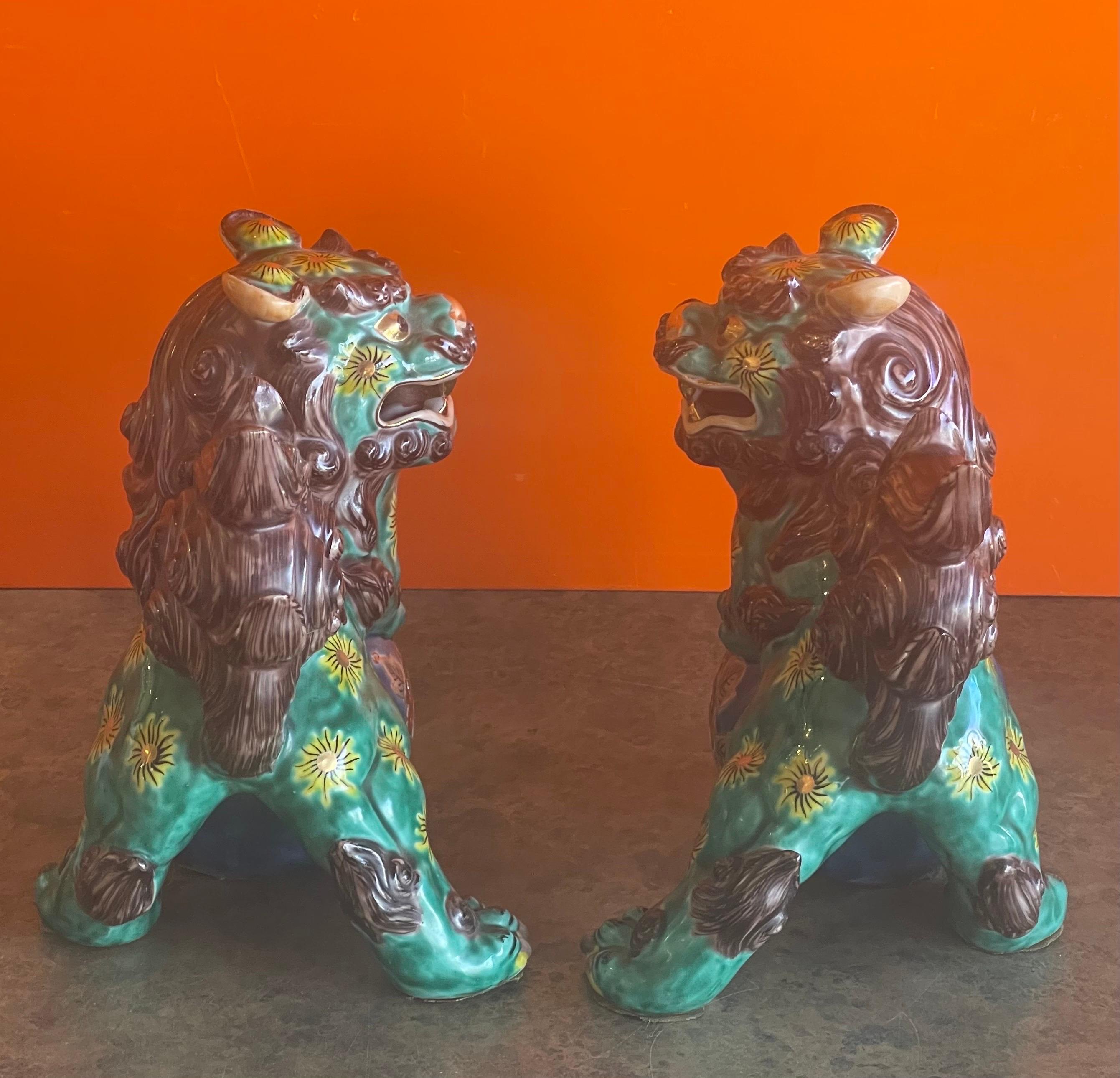 Chinese Pair of Mid-Century Ceramic Polychrome Foo Dogs