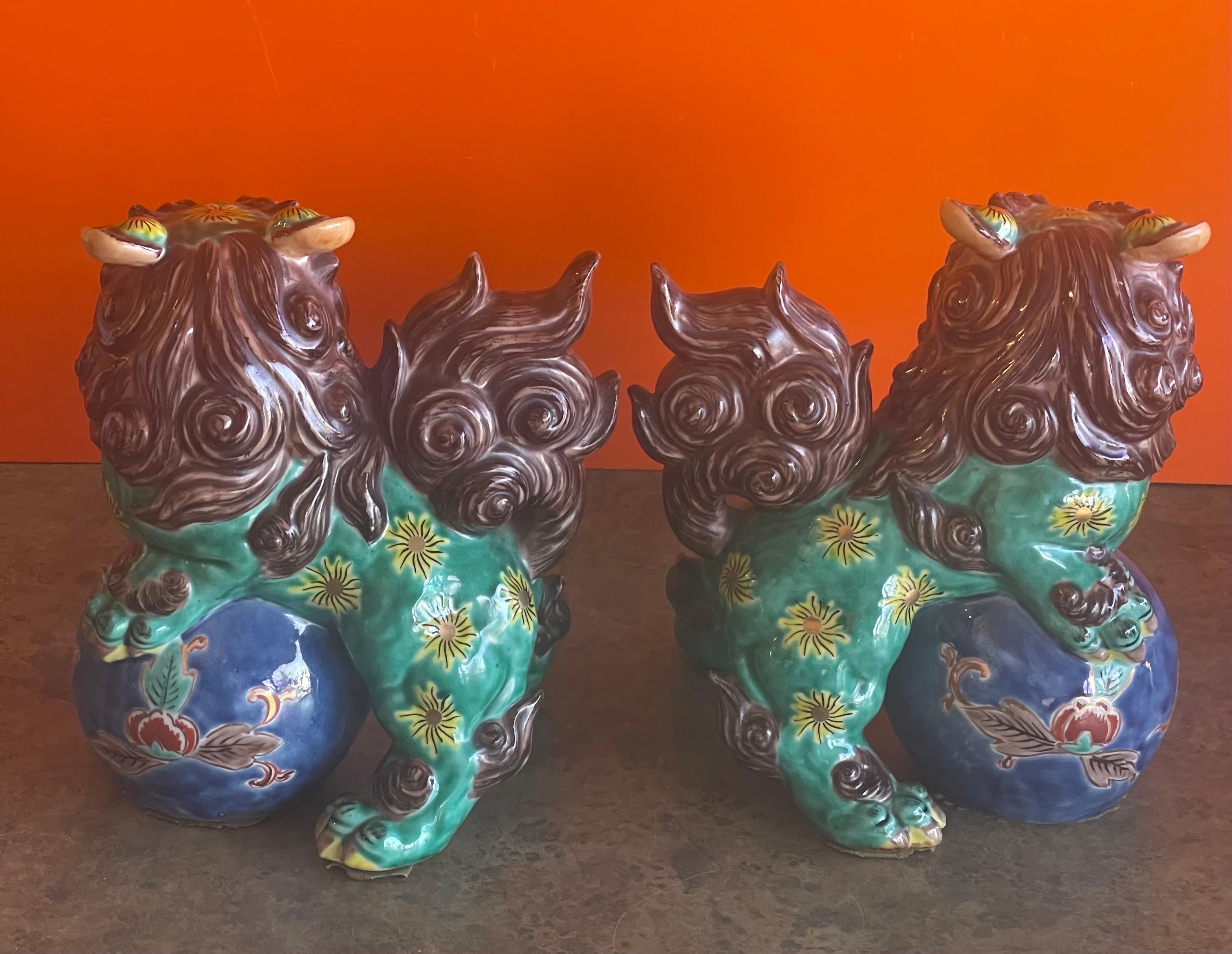 Hand-Crafted Pair of Mid-Century Ceramic Polychrome Foo Dogs