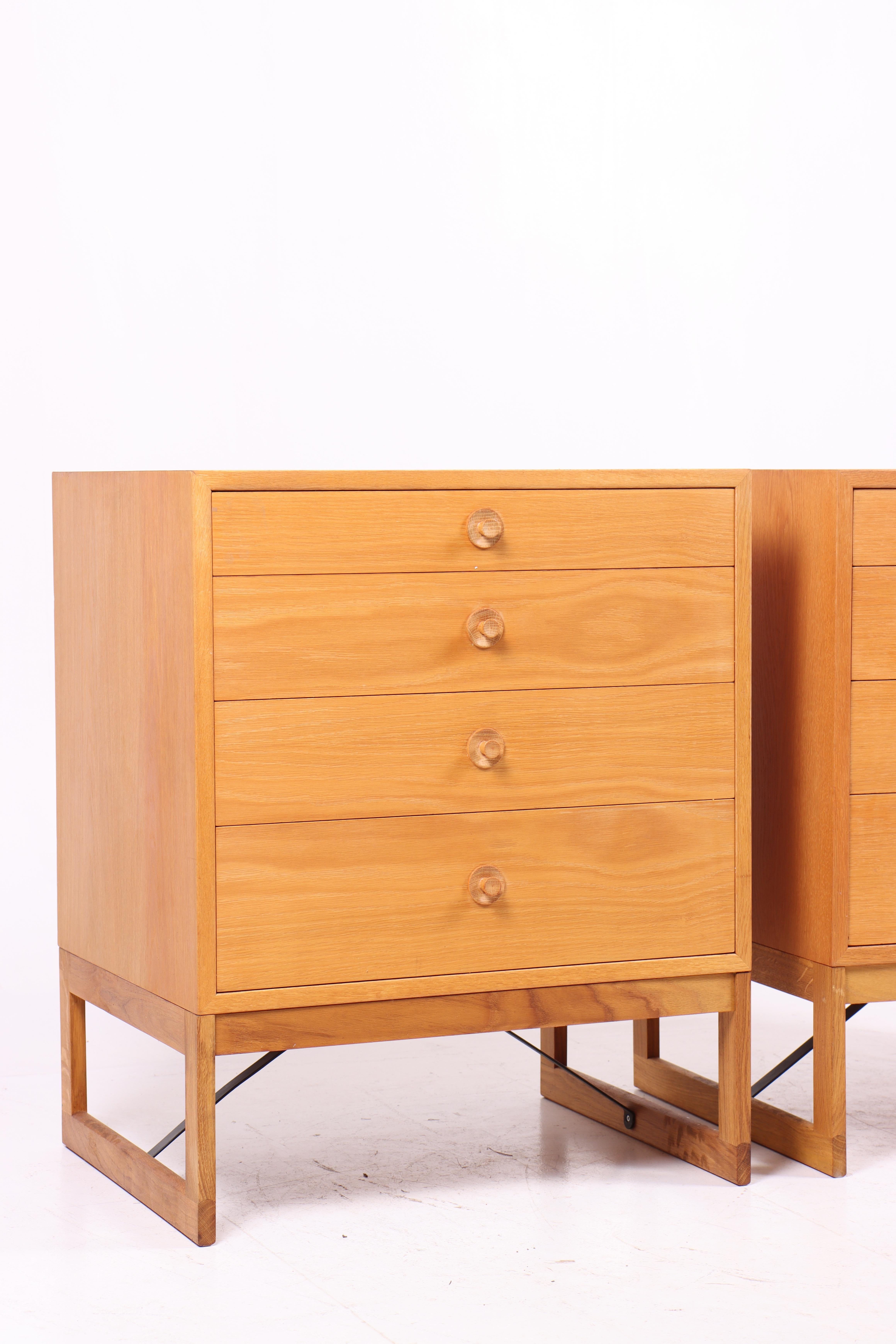 Pair of commodes in oak, designed by Danish architect Børge Mogensen for Karl Andersson cabinetmakers. Made in Sweden in the 1960s. Great original condition.