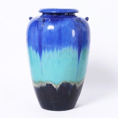 Pair of Mid Century Chinese Glazed Terra Cotta Urns