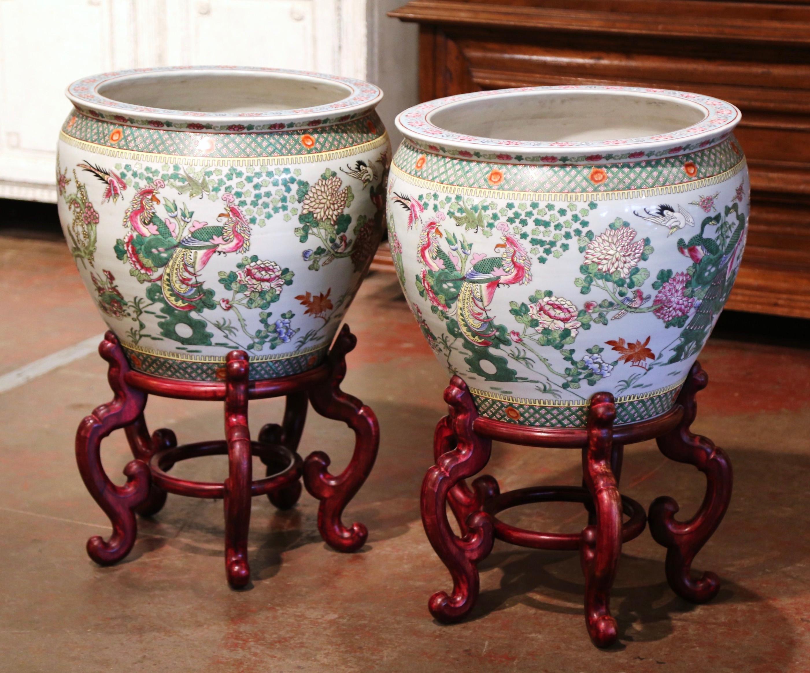 Pair of Mid-Century Chinese Painted Porcelain Fish Bowls on Carved Walnut Stands In Excellent Condition In Dallas, TX