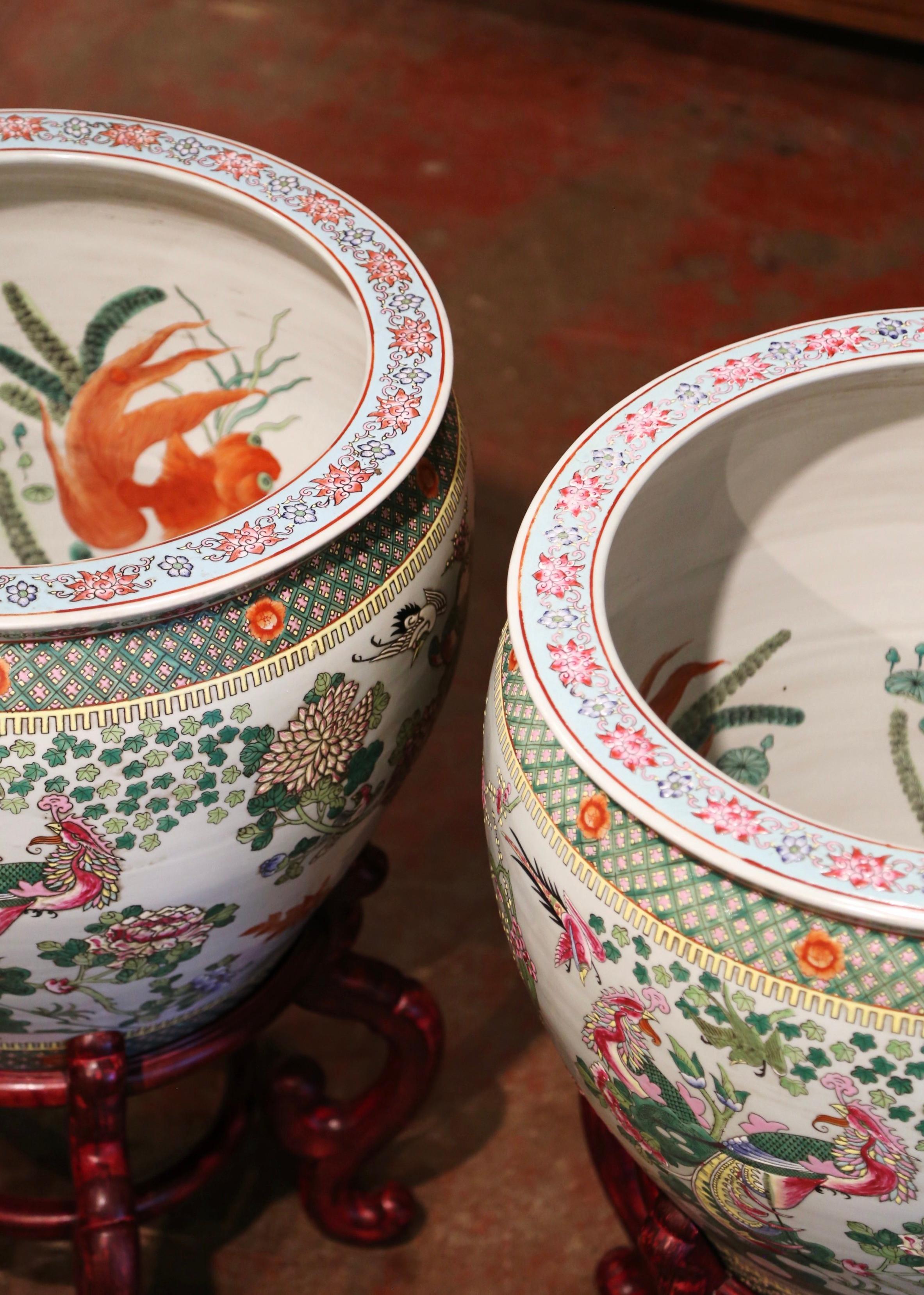 20th Century Pair of Mid-Century Chinese Painted Porcelain Fish Bowls on Carved Walnut Stands