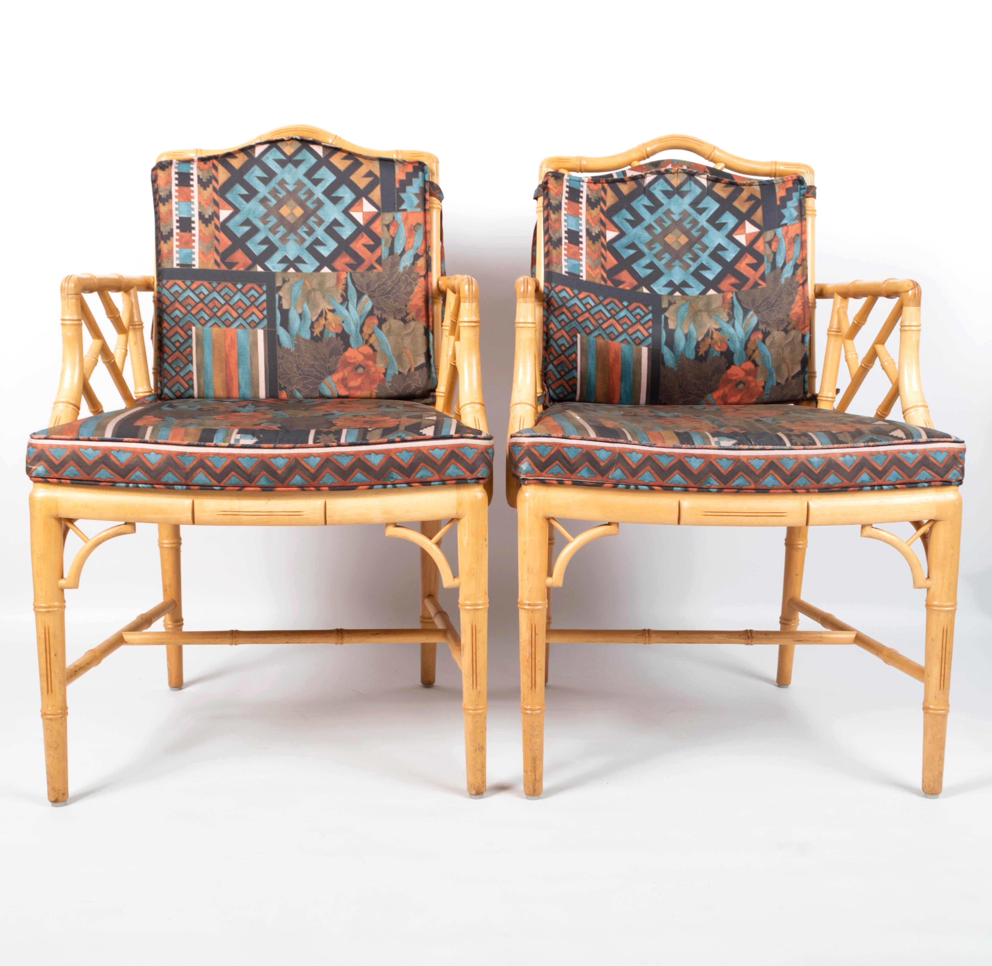 A pair of mid century Chippendale style Faux Bamboo armchairs, 
England, C.1970

In very good condition commensurate with age. Chairs are solid and sturdy.