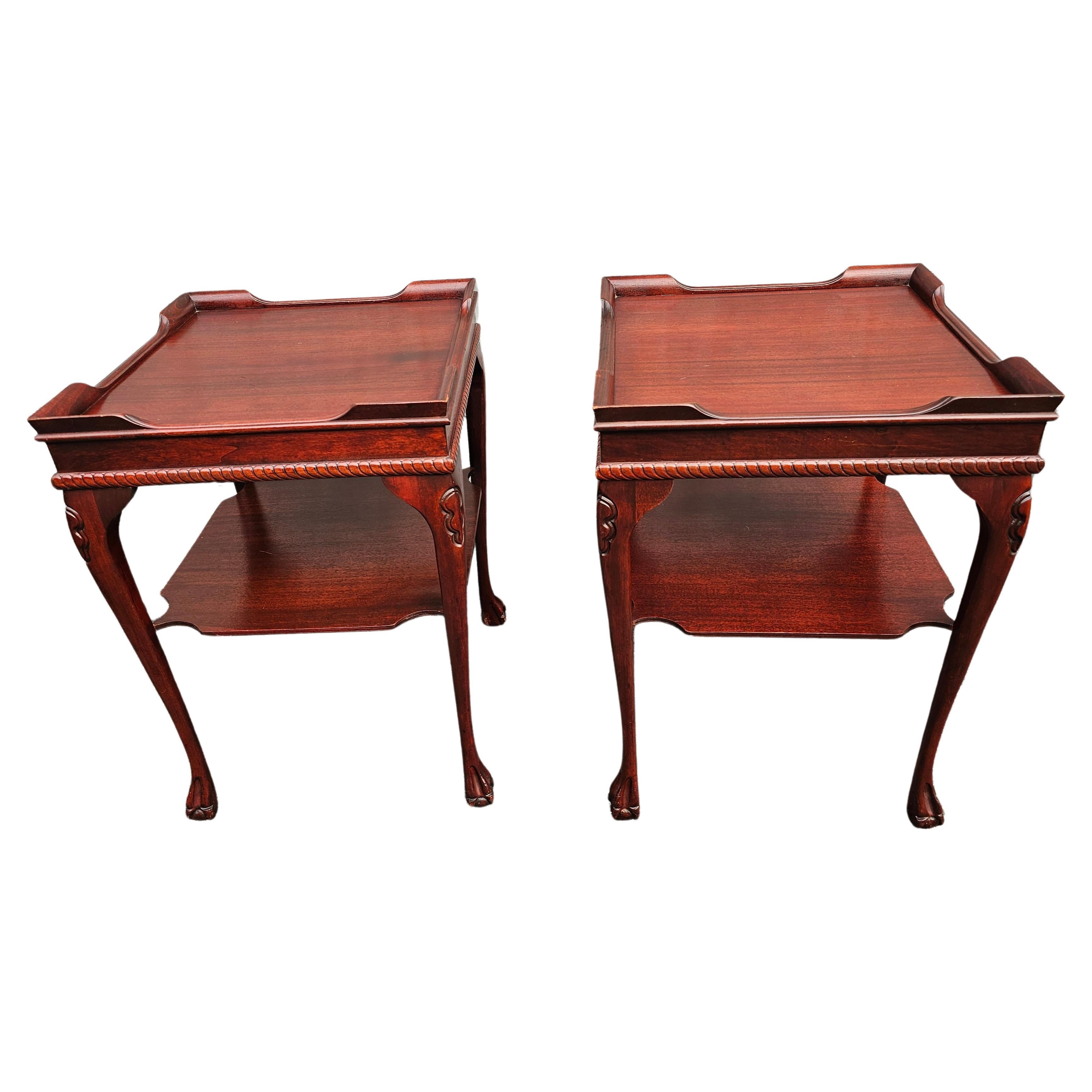 Pair of Mid-Century Chippendale Style Mahogany tiered Side Tables with corner galleries. 
Light weight Solid mahogany. Measure 19.25