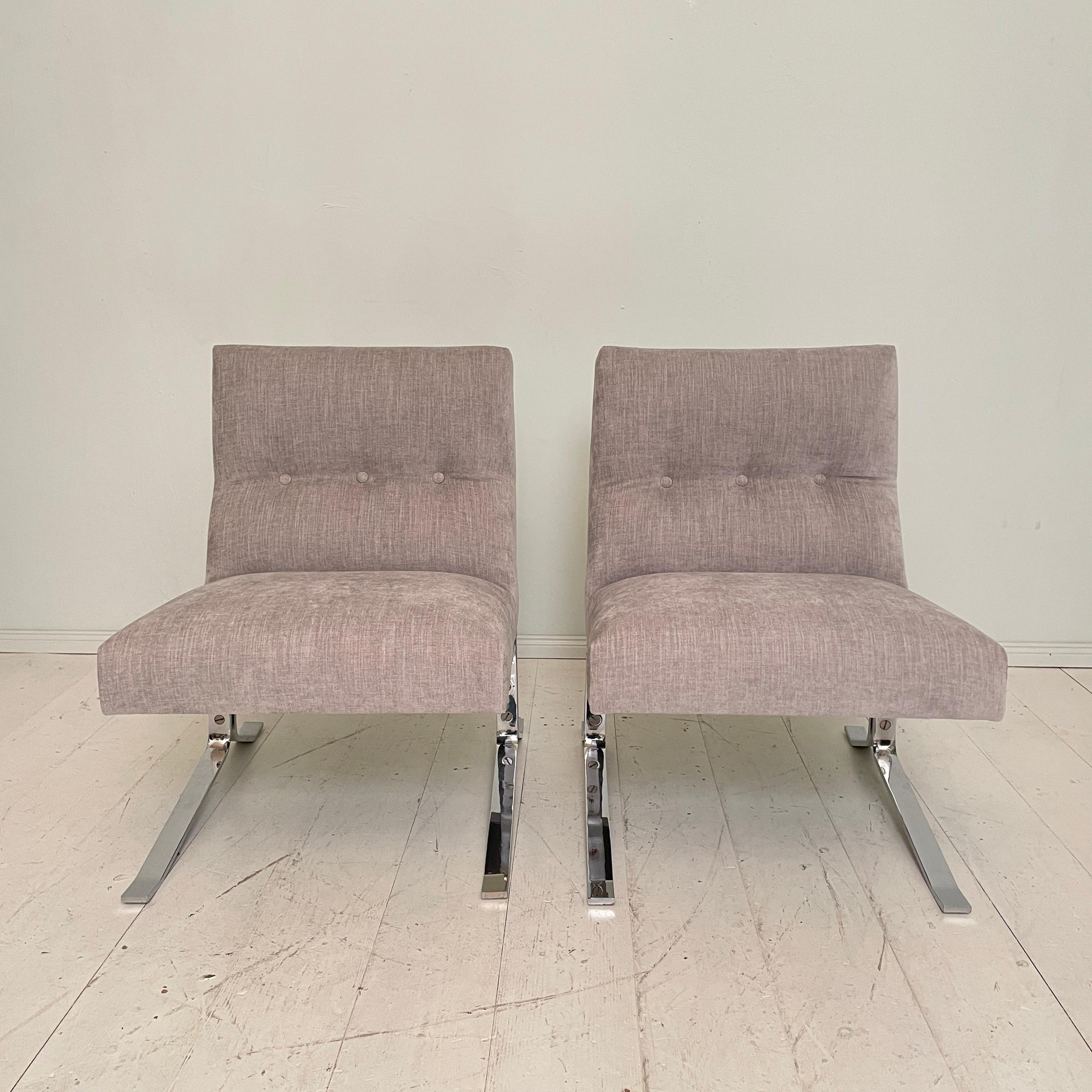 This beautiful Pair of Mid-Century German Lounge Chairs where made around 1970.
They have a metal chrome base and got re-upholstered in a grey fabric.
A unique piece which is a great eye-catcher for your antique, modern, space age or mid-century