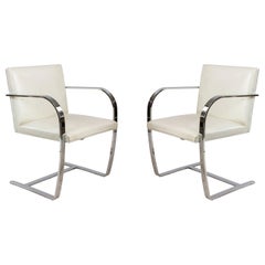 Pair of Mid-Century Chrome and White Leather Armchairs