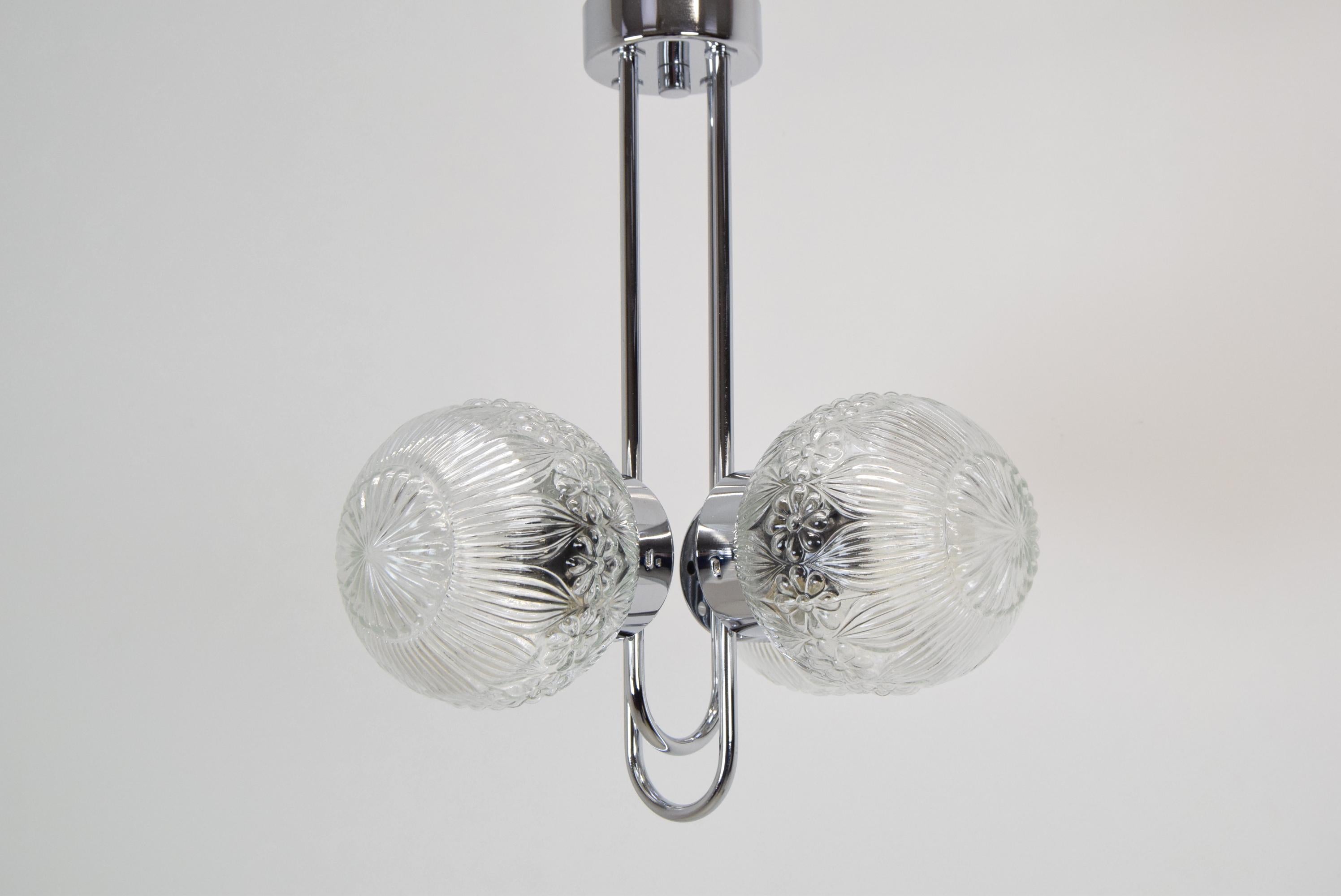 IT is possible to buy one piece
Made in Czechoslovakia
Made of Glass, Chrome
4x60W, E27 or E26 bulb
Fully Functional
US wiring compatible
Good original condition.
 