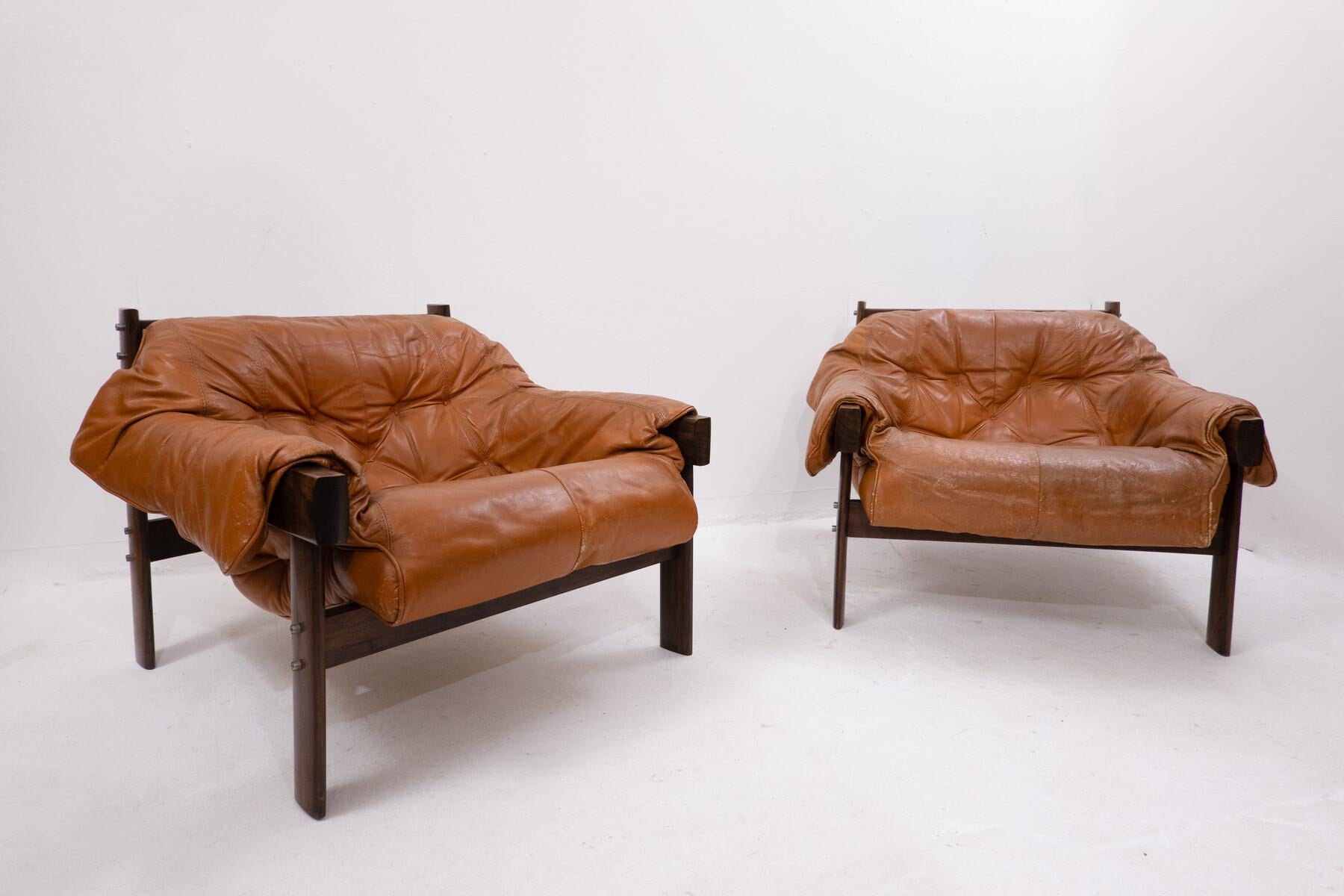 Mid-20th Century Pair of Mid-Century Cognac Leather and Wood Lounge Chairs by Percival Lafer