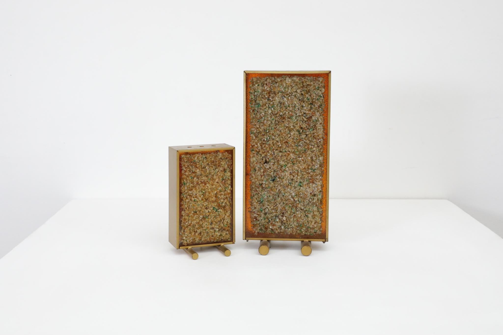 Mid-Century pair of Cosack, brass framed table lamps with inset glass art shades. In original condition with visible scratching and a chip in small lamps glass shade. Small lamp measures 5.75 x 3.5 x 10. Set price.