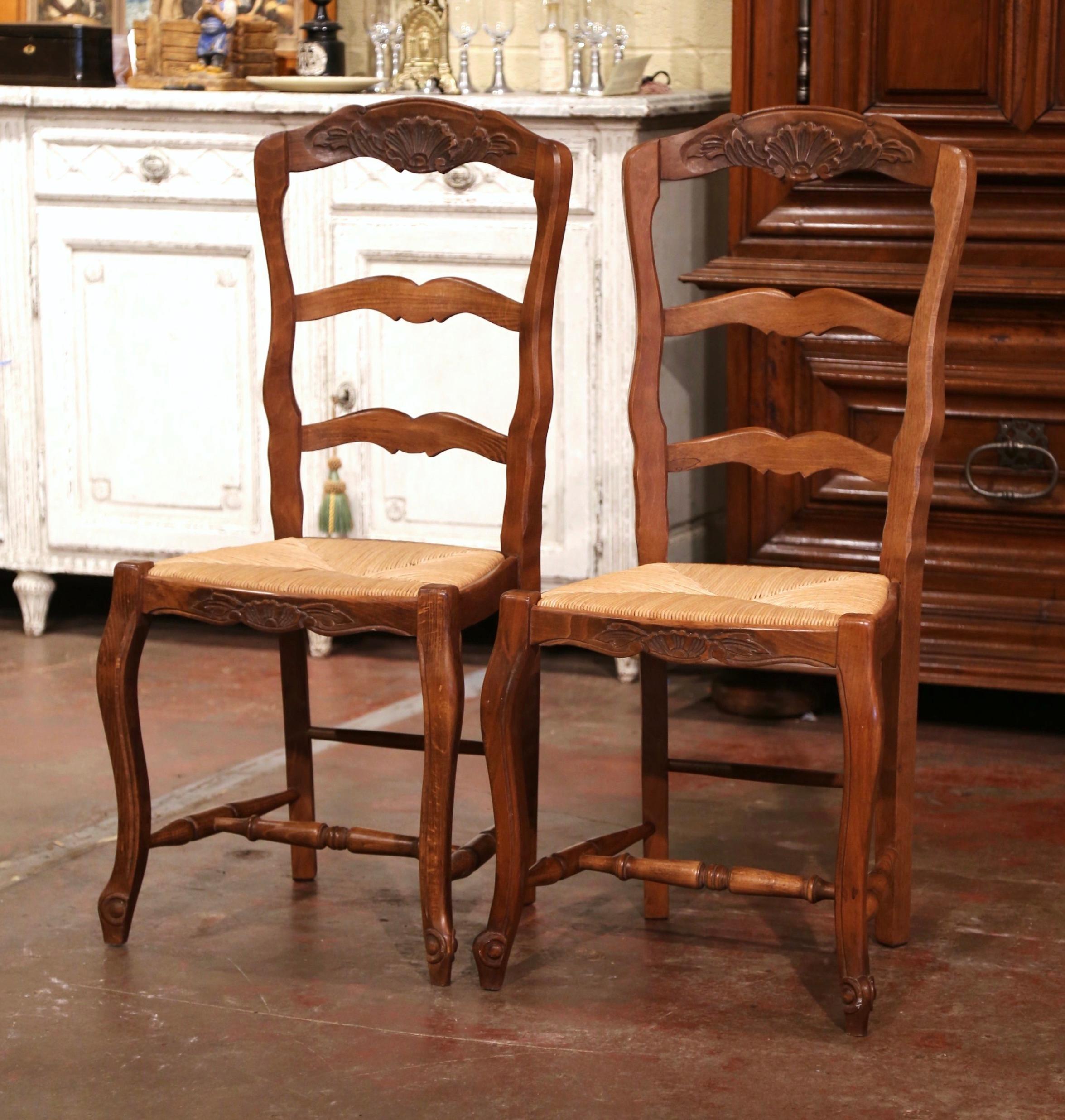 Hand-Carved Pair of Mid-Century Country French Ladder Back Chairs with Rush Seat