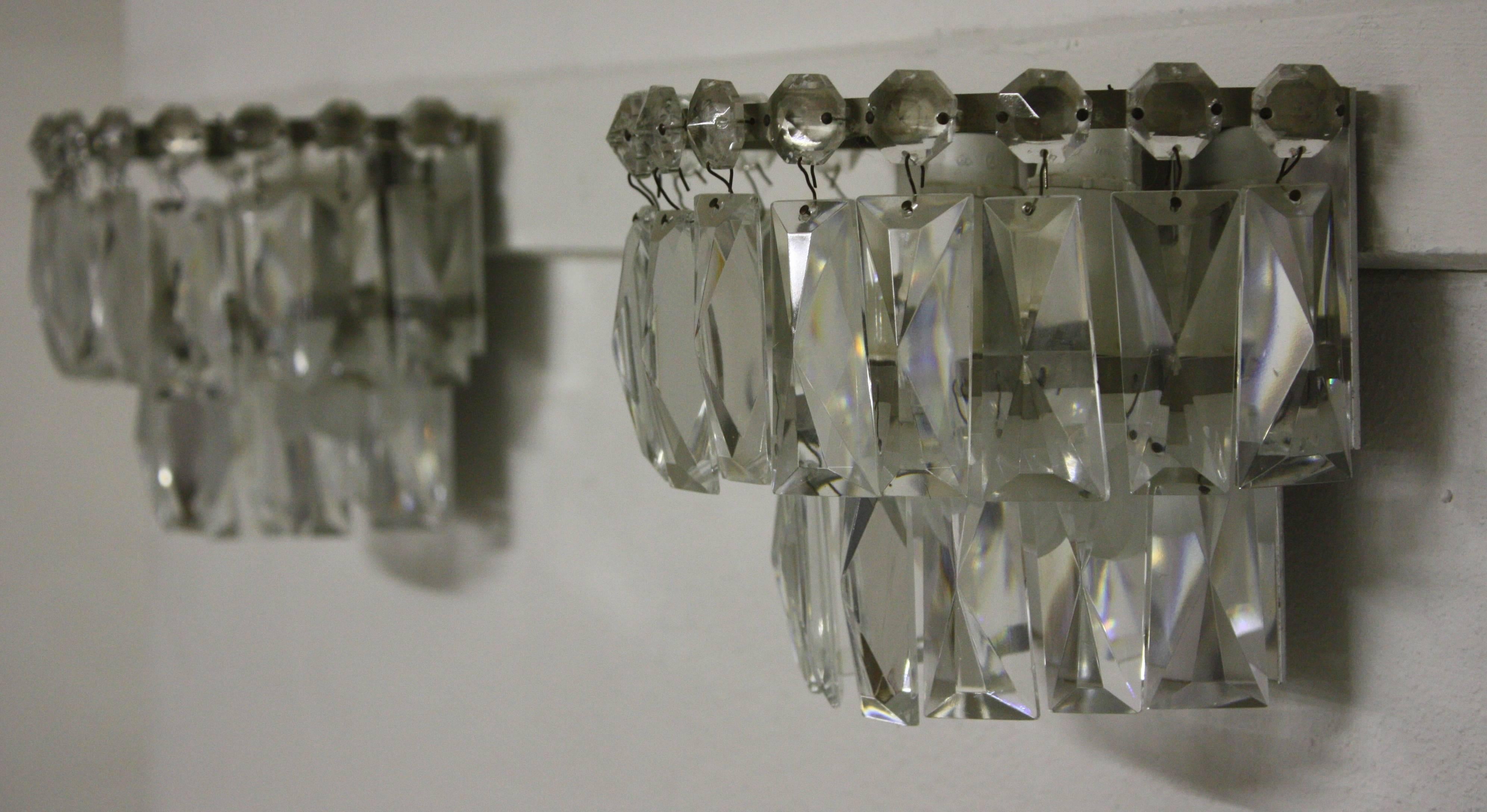 Beautiful pair of nickeled crystal wall lights by Bakalowits, Austria, circa 1960s.
For each two x E14 (Edison) standard screw bulbs.
Excellent condition.
 