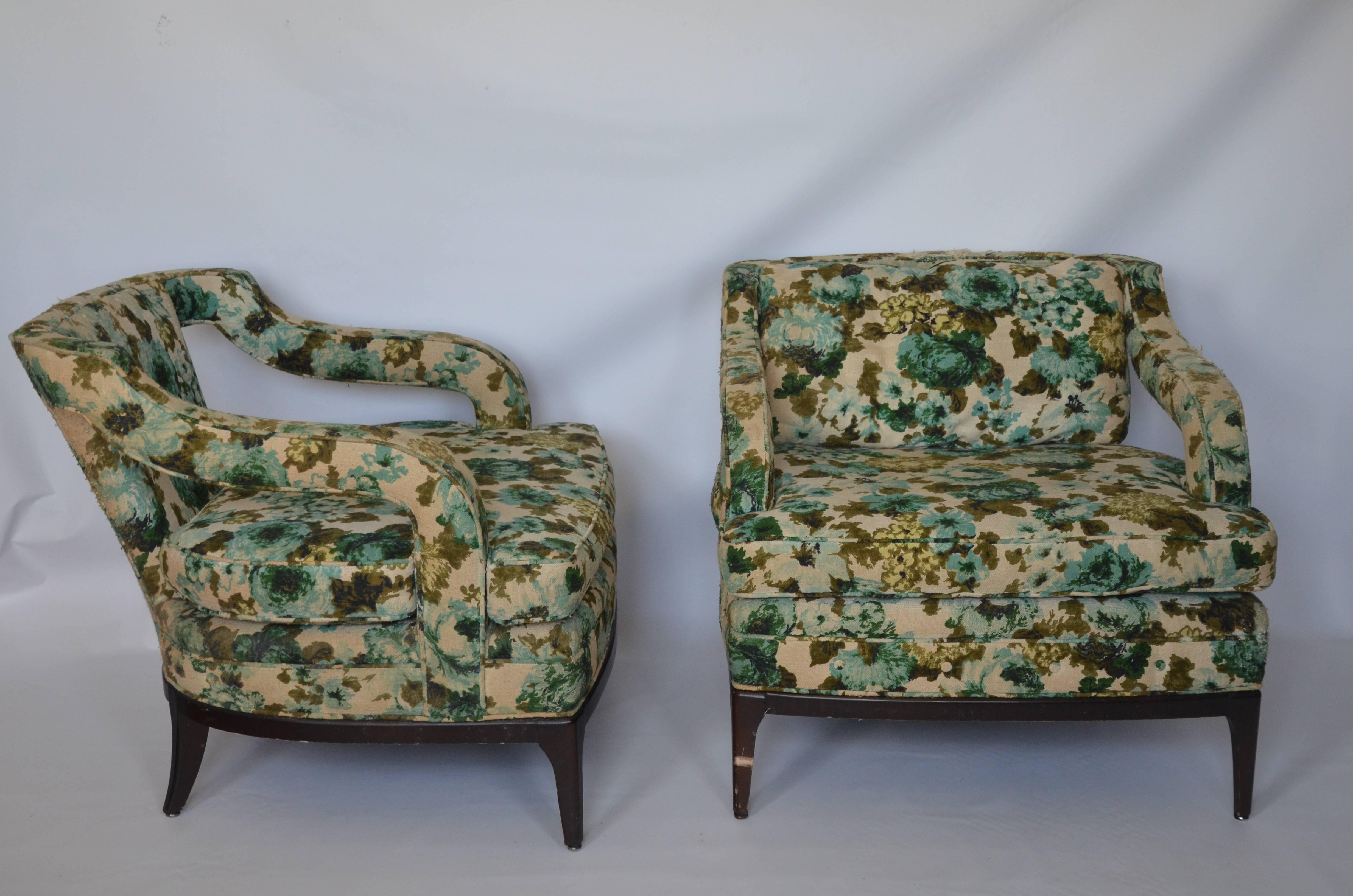 Pair of armchairs by Shaw of Charlotte, NC with interesting lines featuring fully upholstered stylized armrests. The chairs have a bottom and back cushion and are extremely comfortable. These need reupholstered but the bones are very good. The