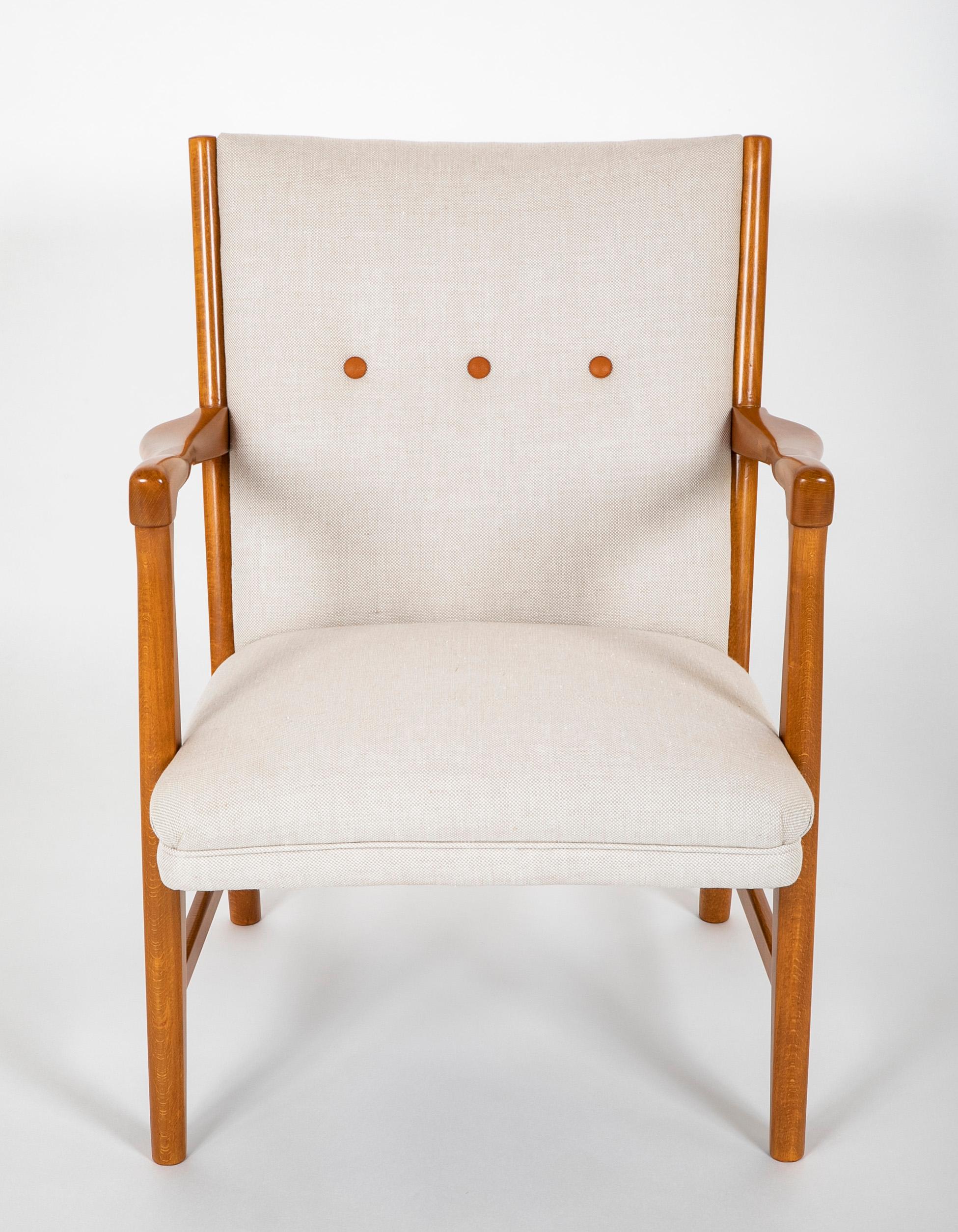 Pair of mid-century Danish beechwood easy chairs. Newly reupholstered.