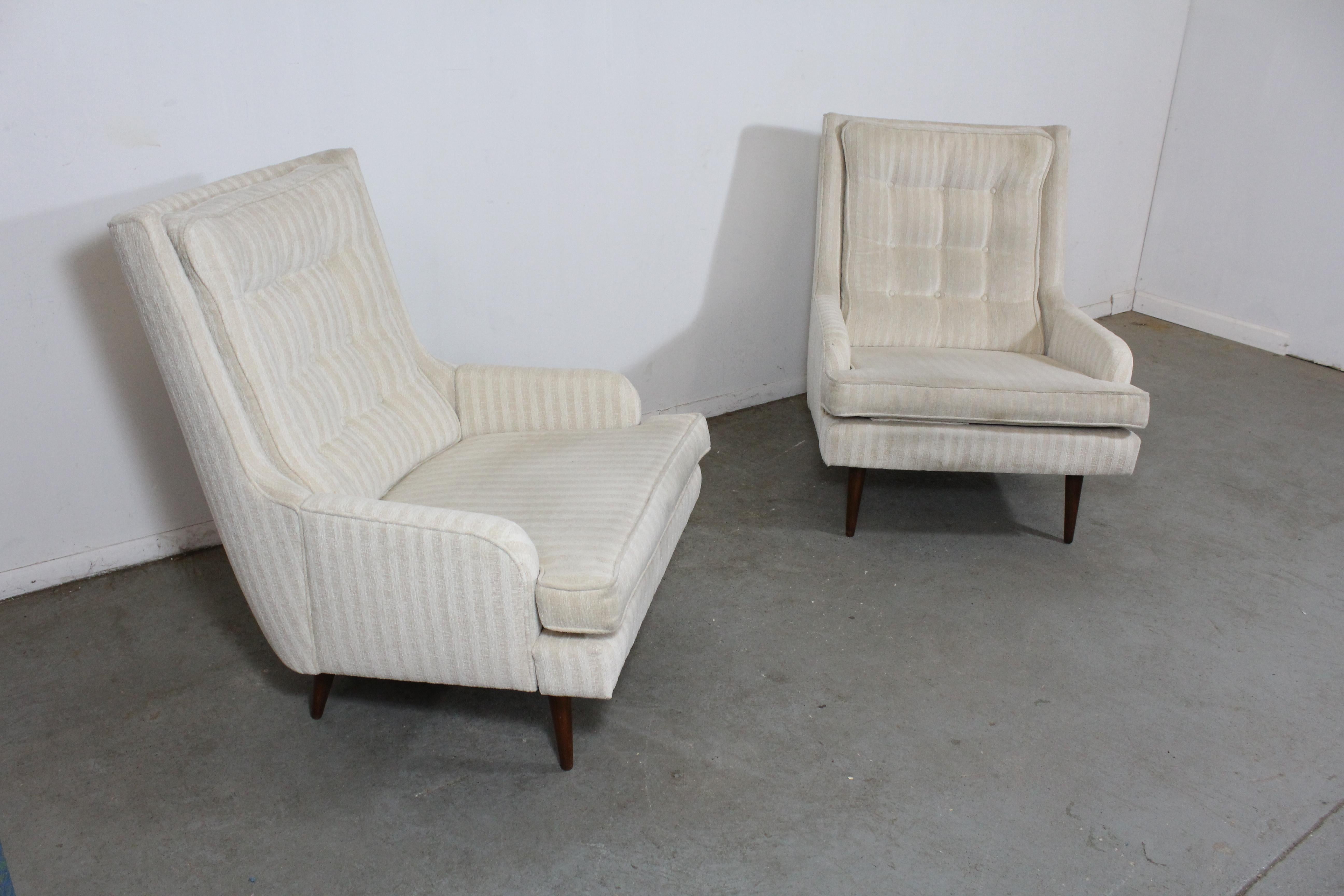 Pair of midcentury Danish modern Paul McCobb style lounge chairs

Offered is a pair of unrestored Mid-Century Modern lounge chairs similar to the style of Paul McCobb. These chairs can stand to be reupholstered but they are overall structurally