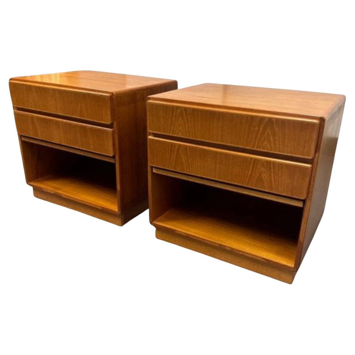 Beautiful pair of mid century Danish modern teak double-drawer nightstands. Great simple design and great vintage condition - clean inside and out. Drawers slide smooth with high end construction and with open space below drawer. Has hidden pull out