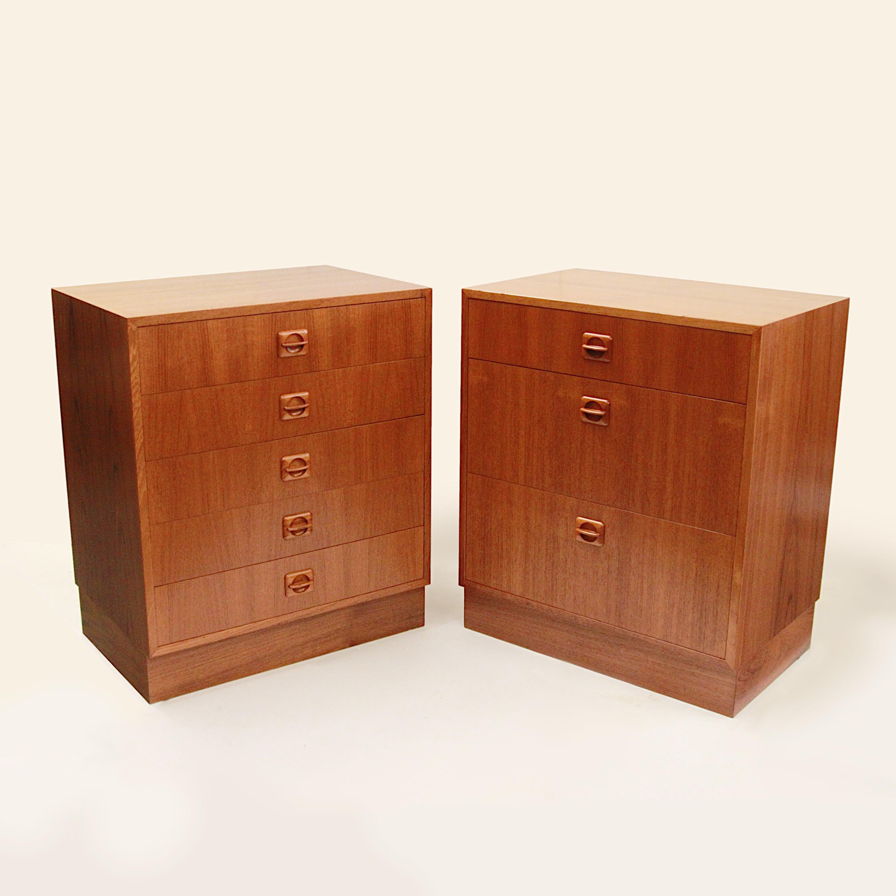 Wonderful matching pair of Danish dressers/nightstands. Dressers feature gorgeous teak veneer, sculpted teak drawer pulls and plenty of drawers (5 & 3 respectively)! With their soft wood tones Minimalist lines, and ample storage, these would make