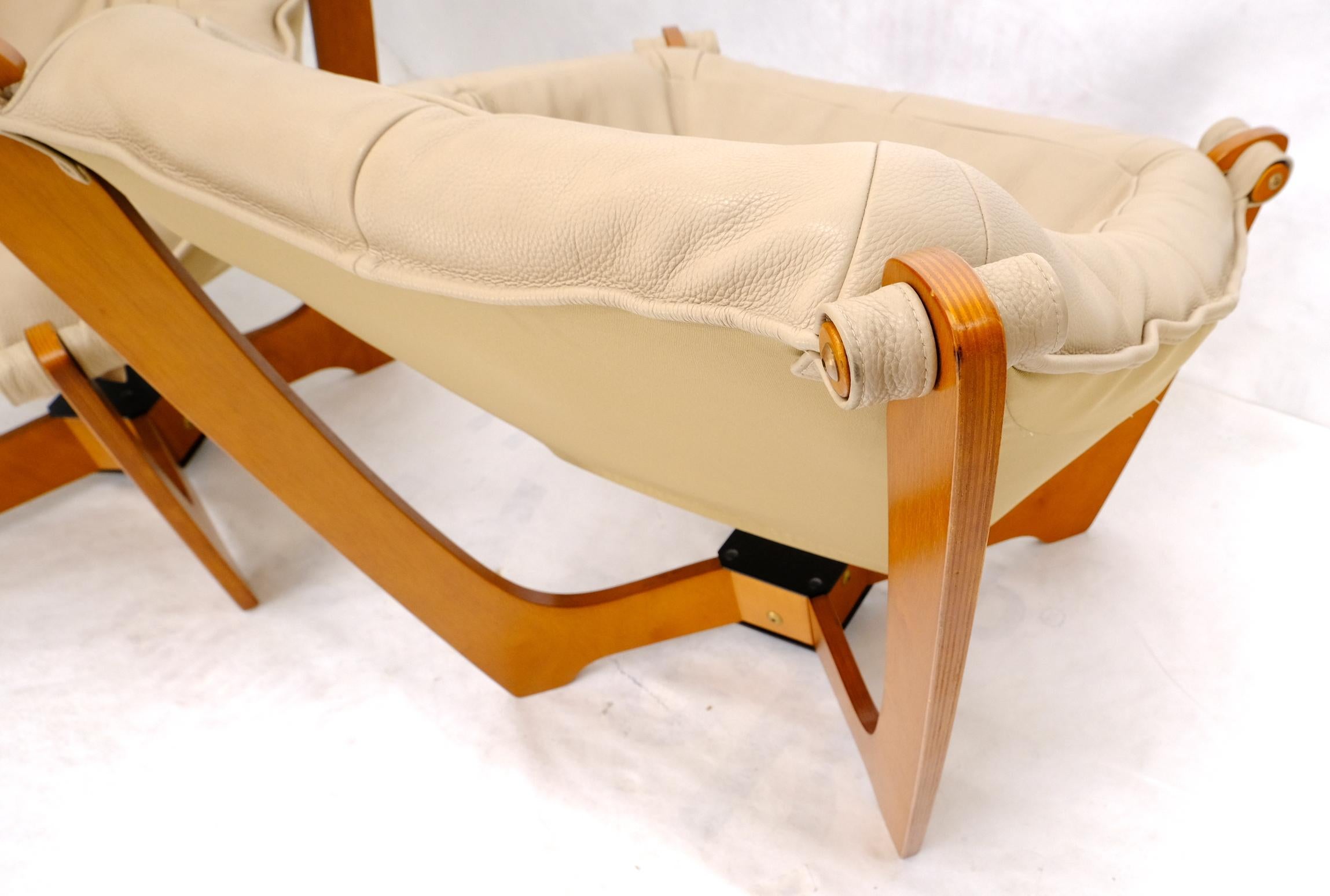 Paire de fauteuils de salon danois modernes du milieu du siècle avec cadres en teck et assise en cuir en vente 7