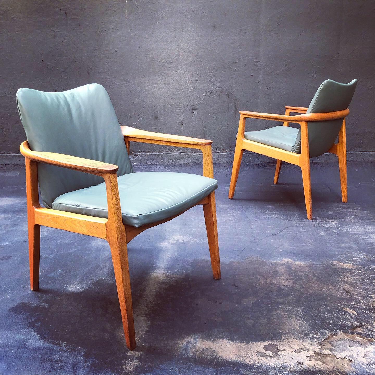 Gorgeous pair of Danish modern side chairs designed by Sigvard Bernadotte (a member of the Swedish Royal Family) and made by renowned furniture maker France & Son. These chairs feature beautifully sculpted/twisted teak frames and new moss-green