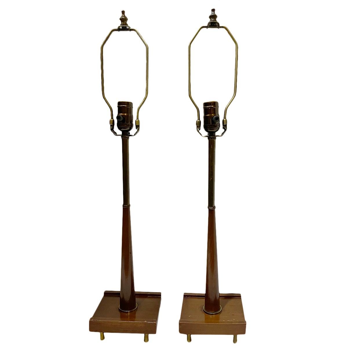 Pair of circa 1950's Danish modern wood table lamps.

Measurements:
Height of body: 18.5