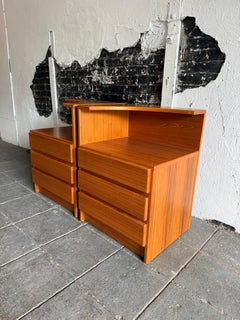 Pair of Mid Century Danish teak 3 drawer nightstands with top curved shelf