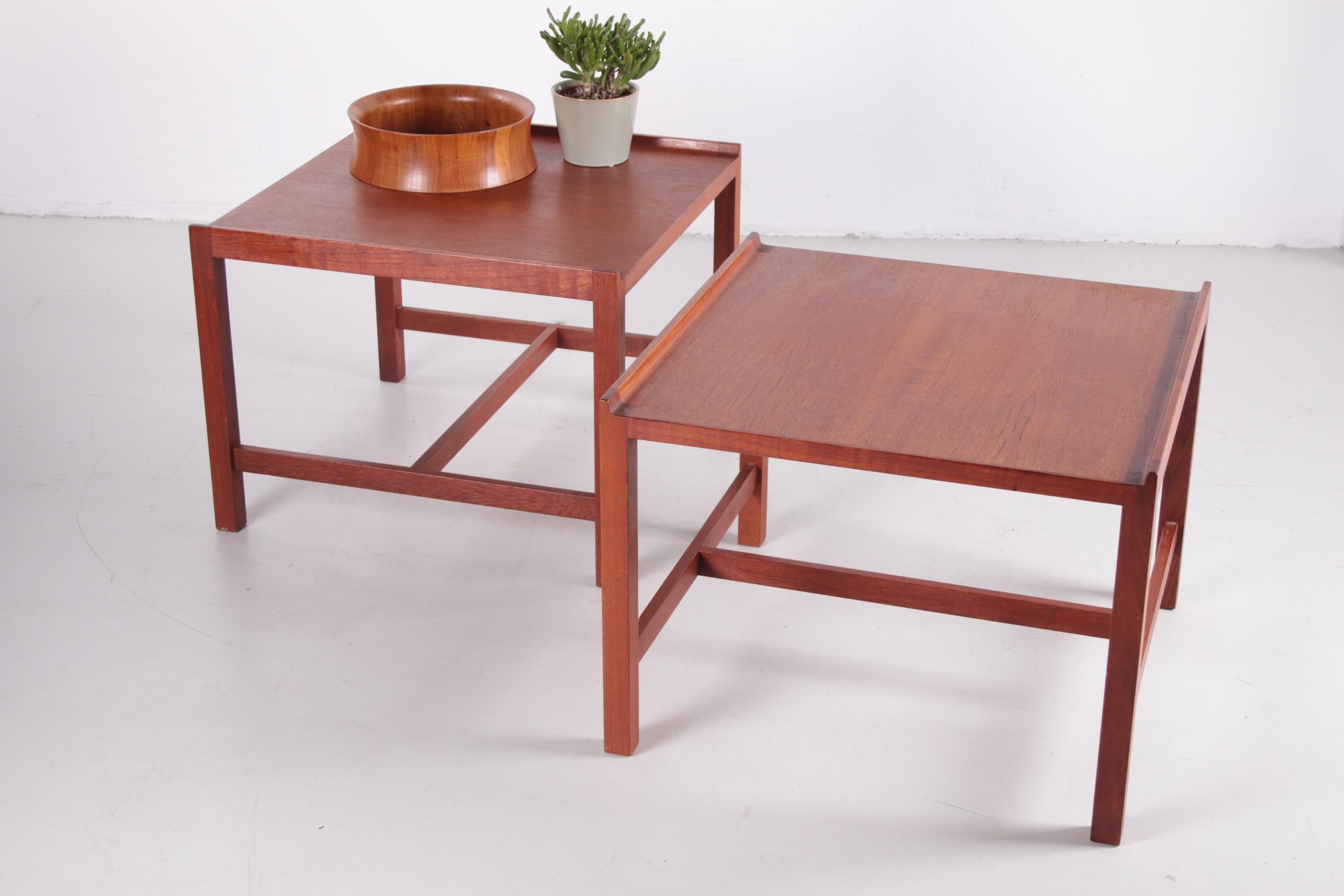 Illums Bolighus Danish set of teak tables, 1960 Denmark.

A lovely pair of mid-century Danish side tables in teak, with a clean, minimalist design by Illums Bolighus.

Pair of Danish teak side tables nice to put together for a larger coffee table