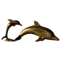 Pair of Mid Century decorative brass Dolphin figurines